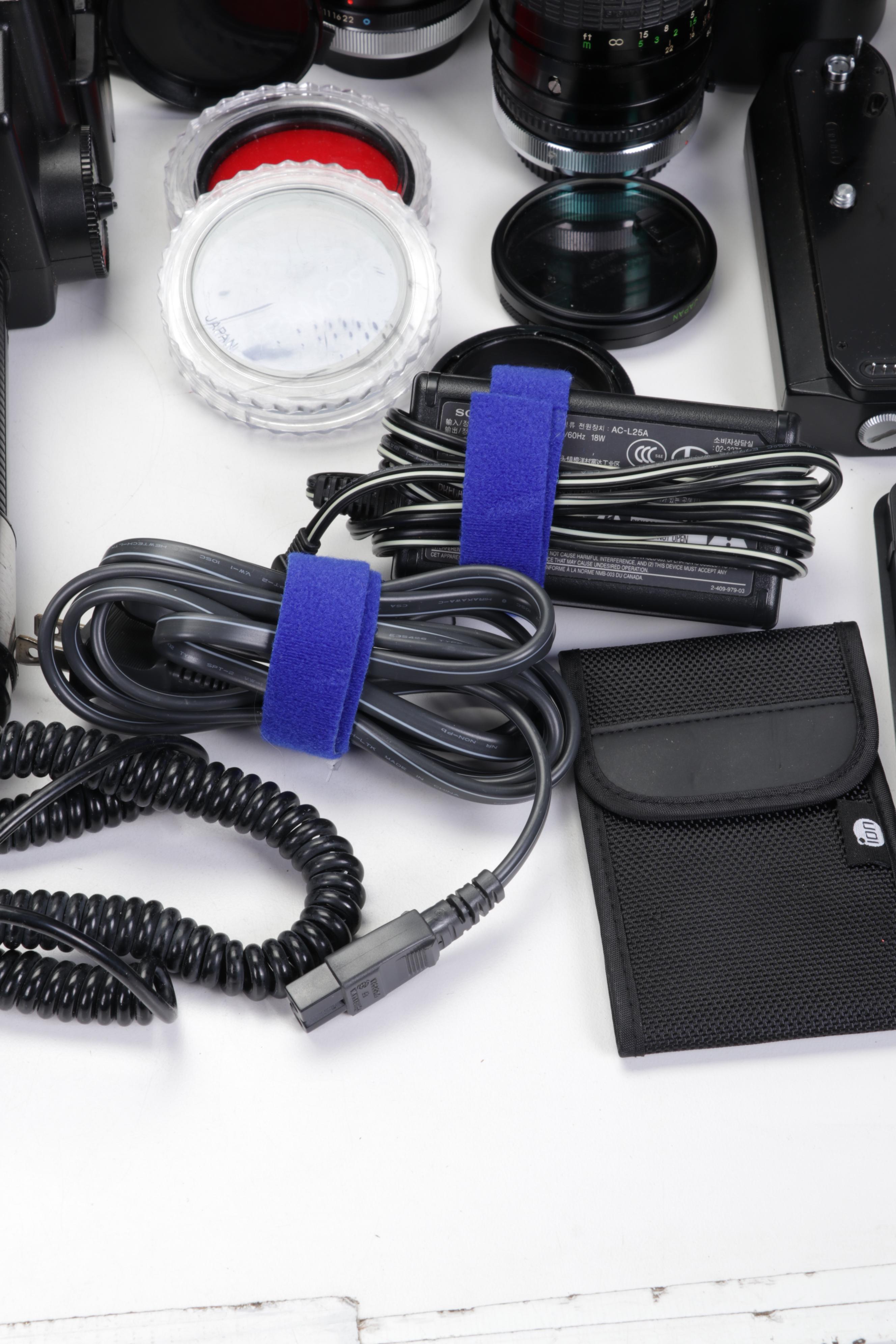 Canon 35mm Film Cameras with Assorted Lenses and Equiptment