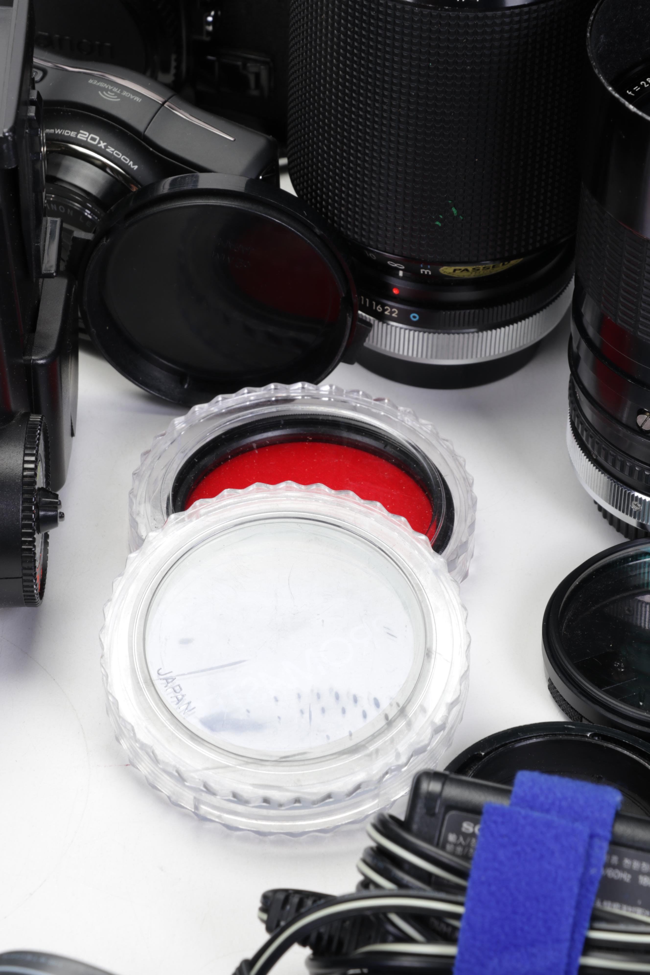 Canon 35mm Film Cameras with Assorted Lenses and Equiptment