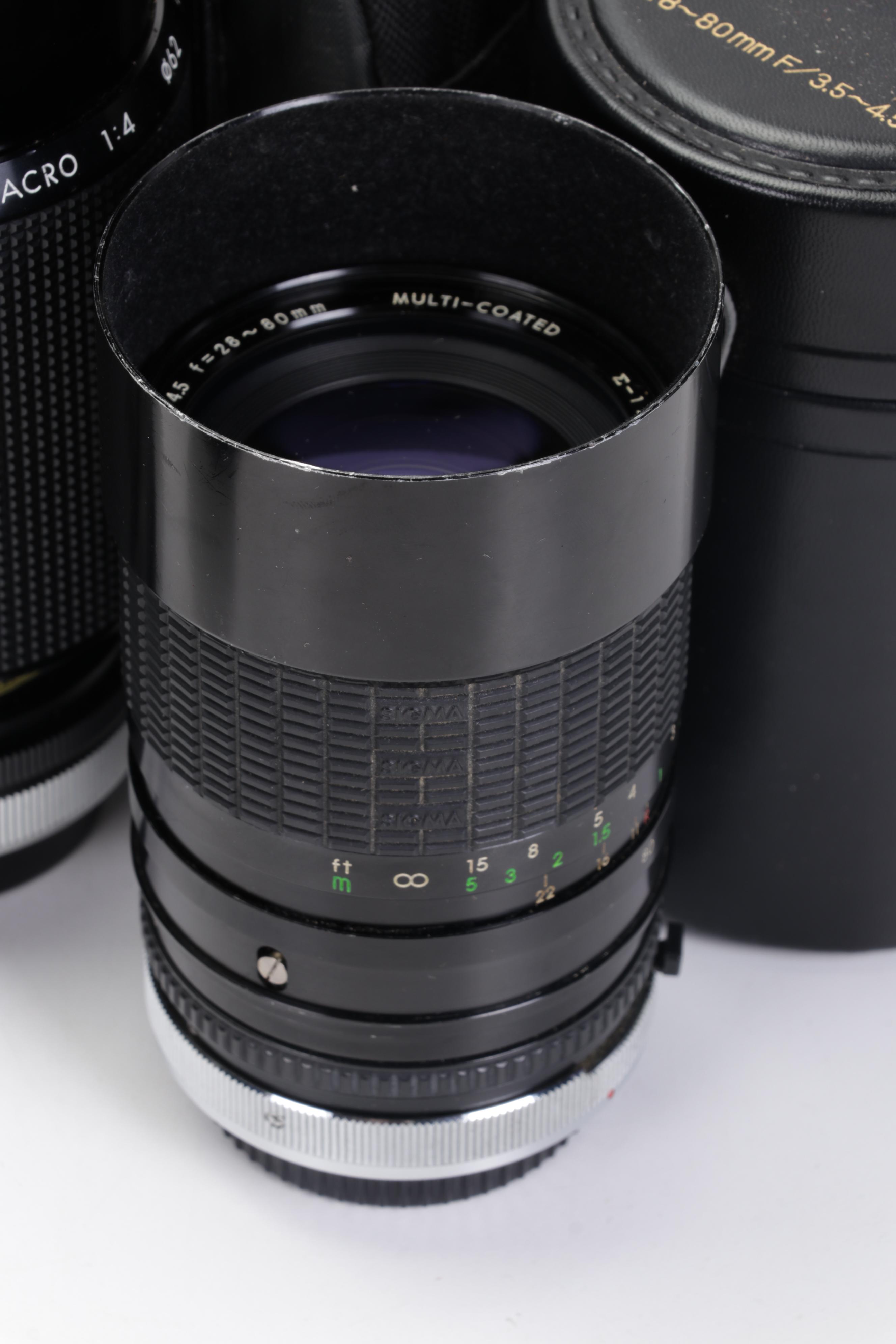 Canon 35mm Film Cameras with Assorted Lenses and Equiptment