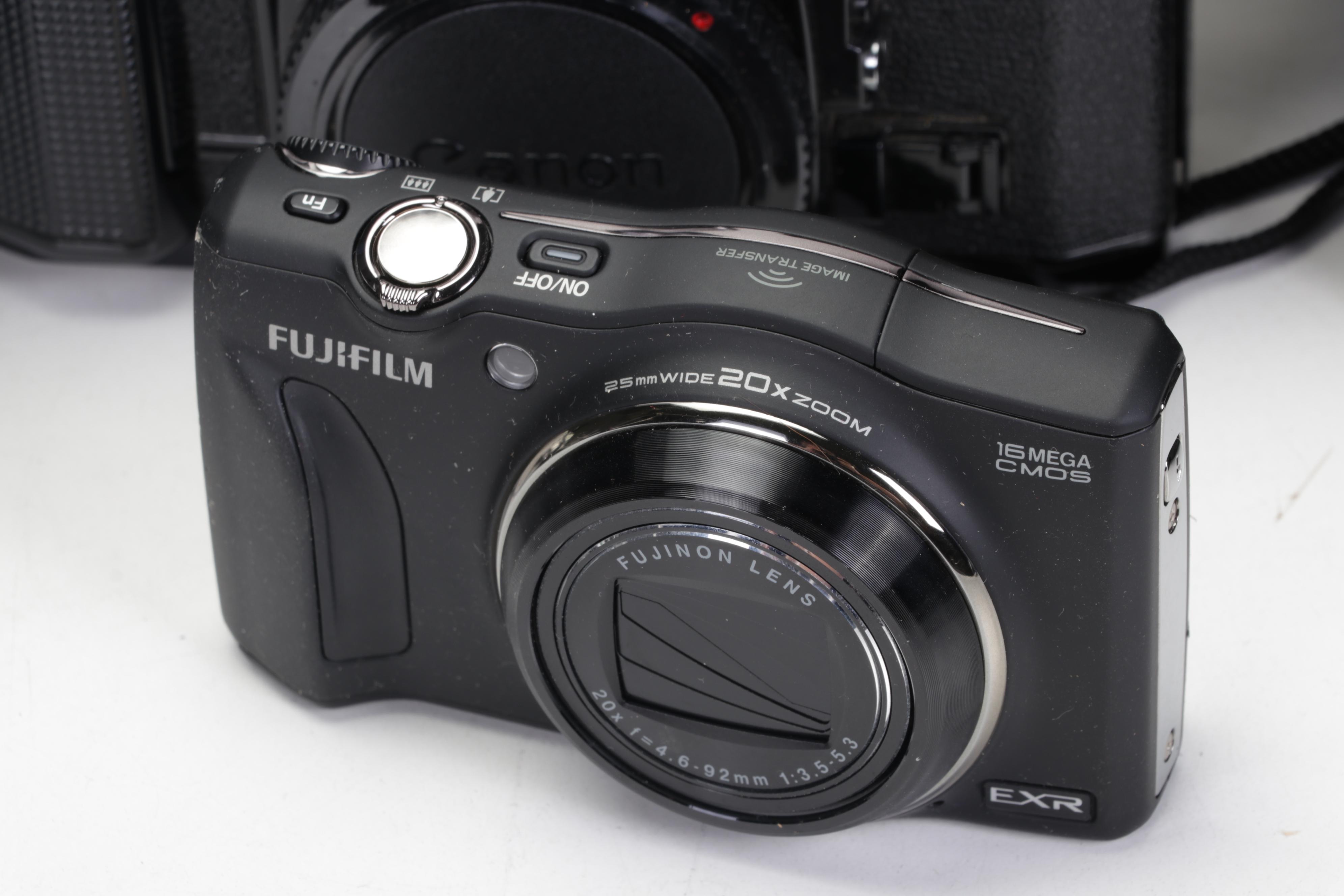 Canon 35mm Film Cameras with Assorted Lenses and Equiptment