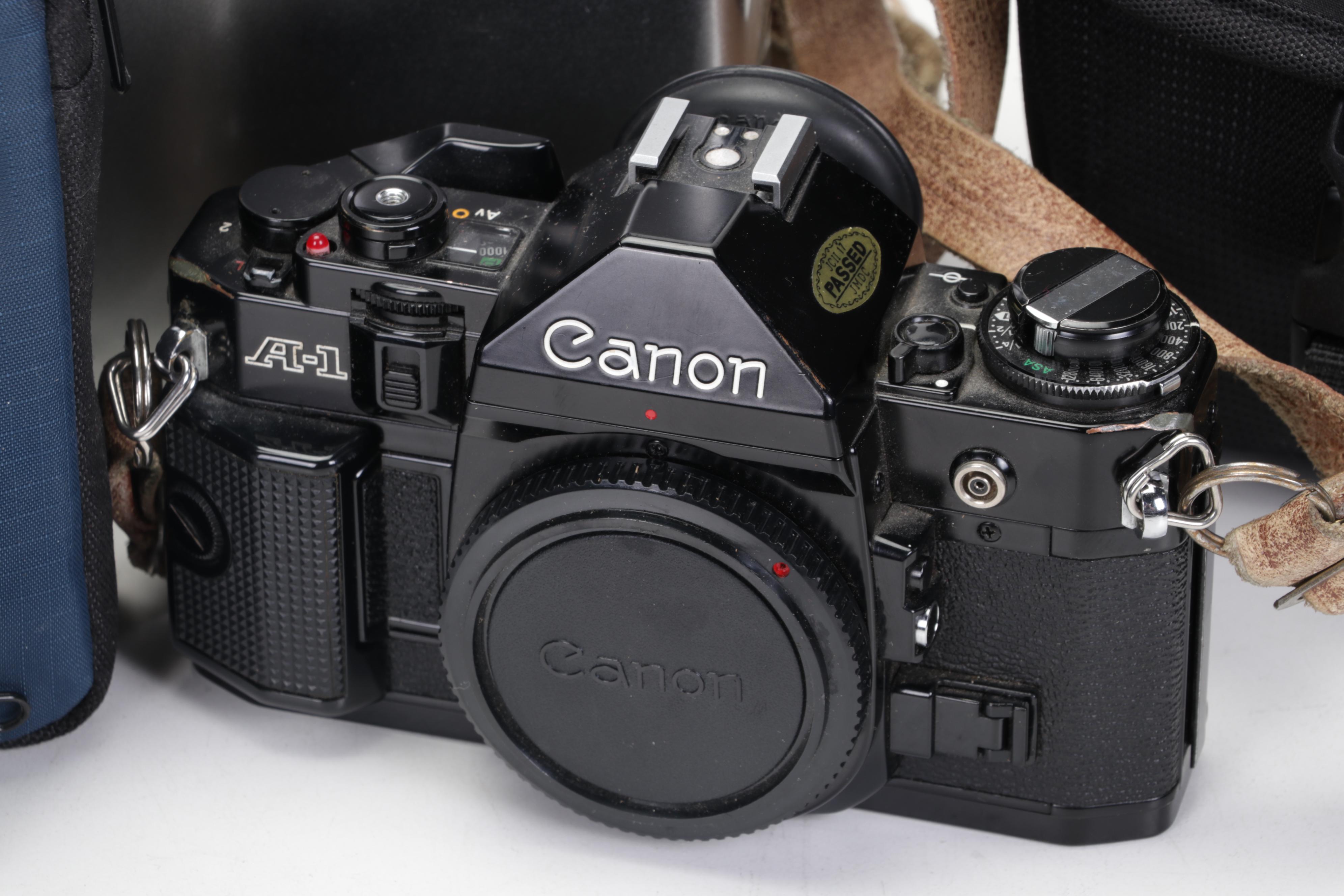 Canon 35mm Film Cameras with Assorted Lenses and Equiptment