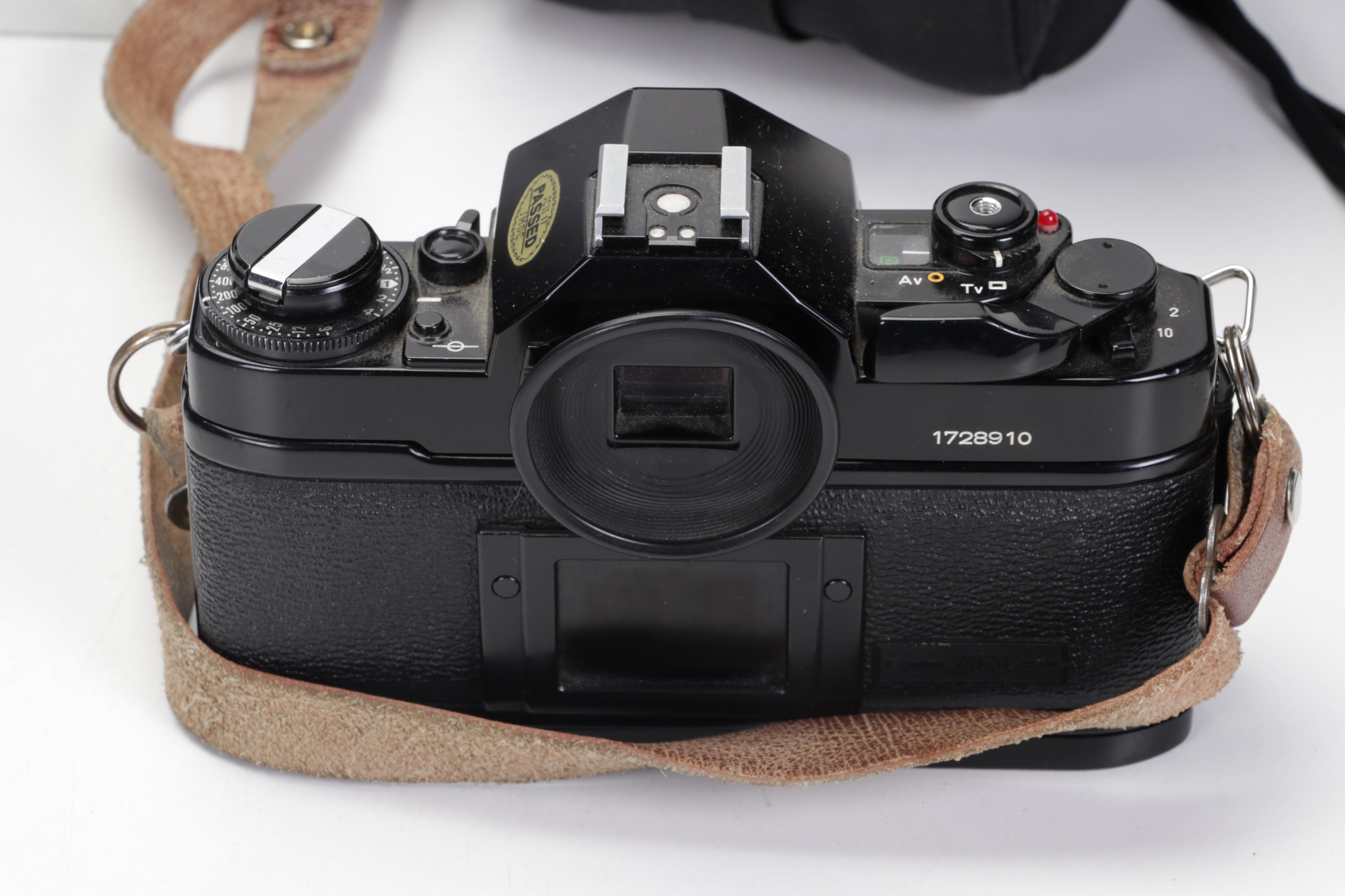 Canon 35mm Film Cameras with Assorted Lenses and Equiptment