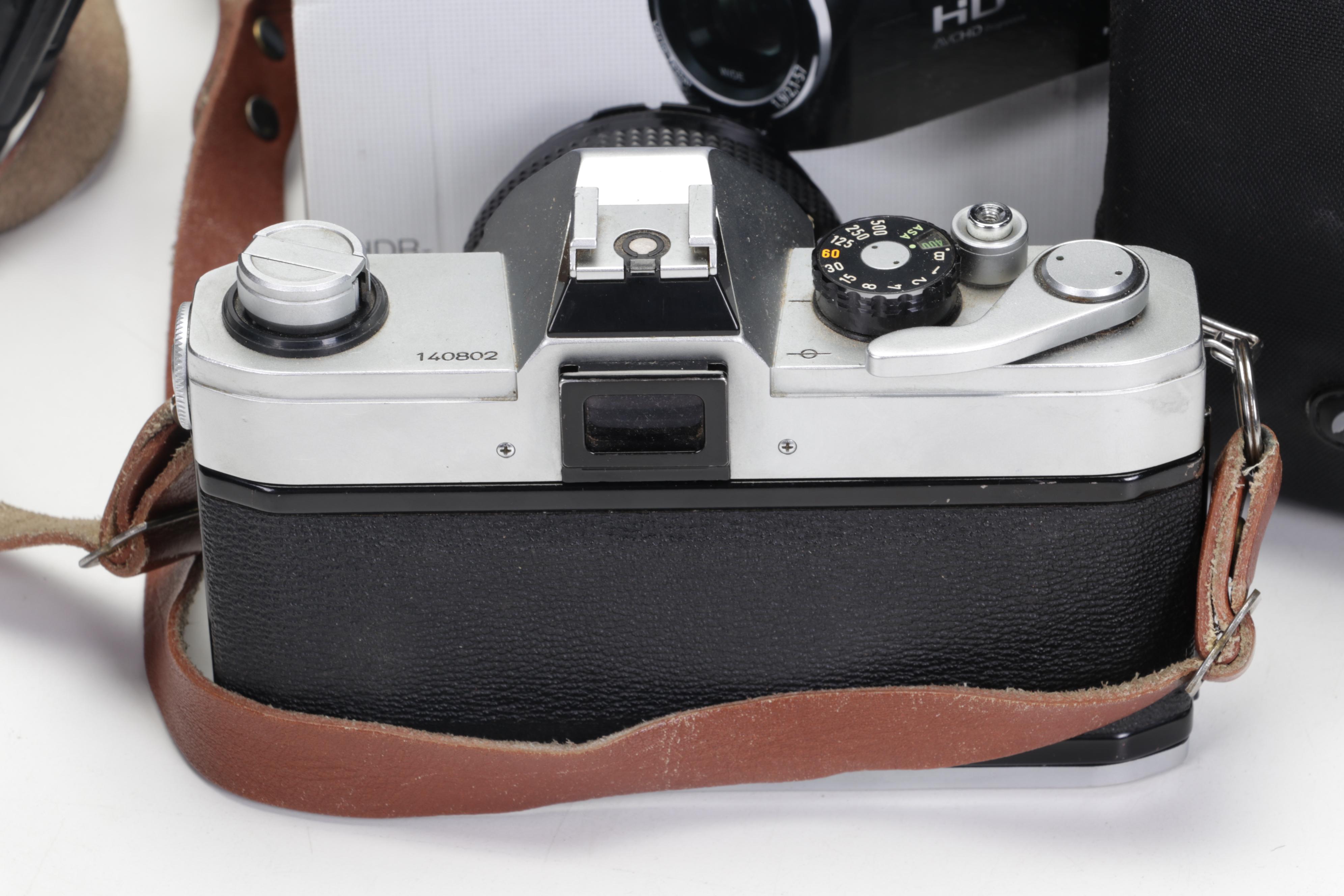 Canon 35mm Film Cameras with Assorted Lenses and Equiptment