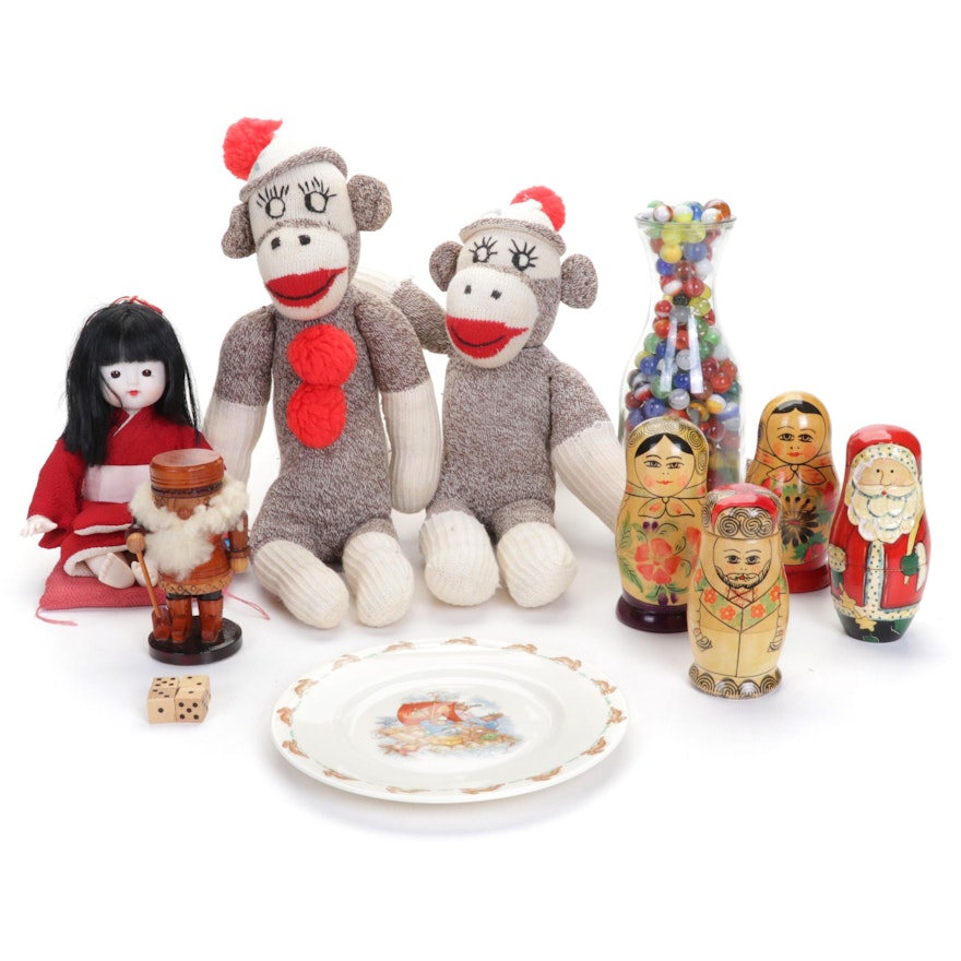 Nutcracker, Sock Monkey Dolls, Matryoshka Dolls, Glass Marbles, and More