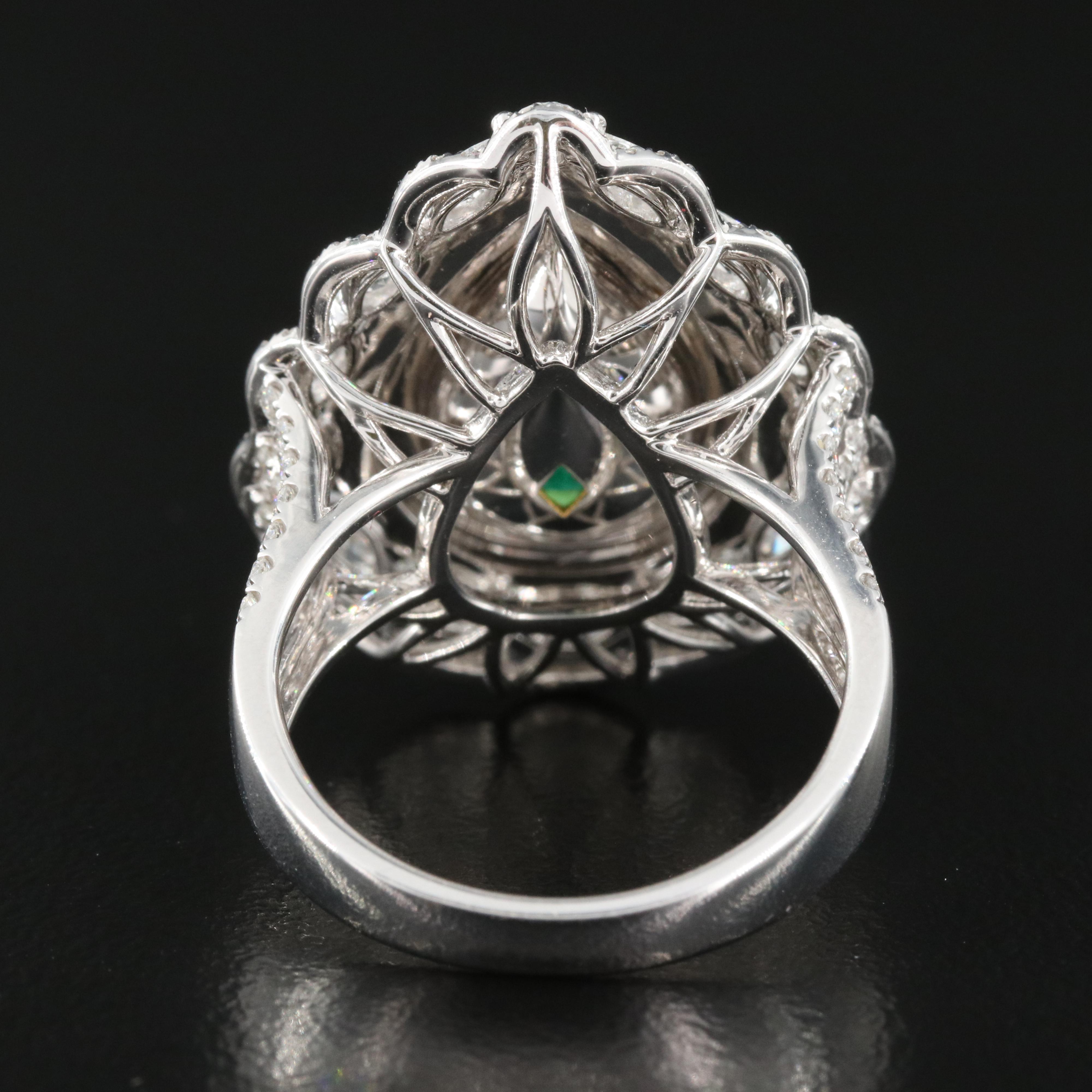 18K 4.53 CT Emerald Teardrop Ring with 1.74 Diamond Scalloped Halo