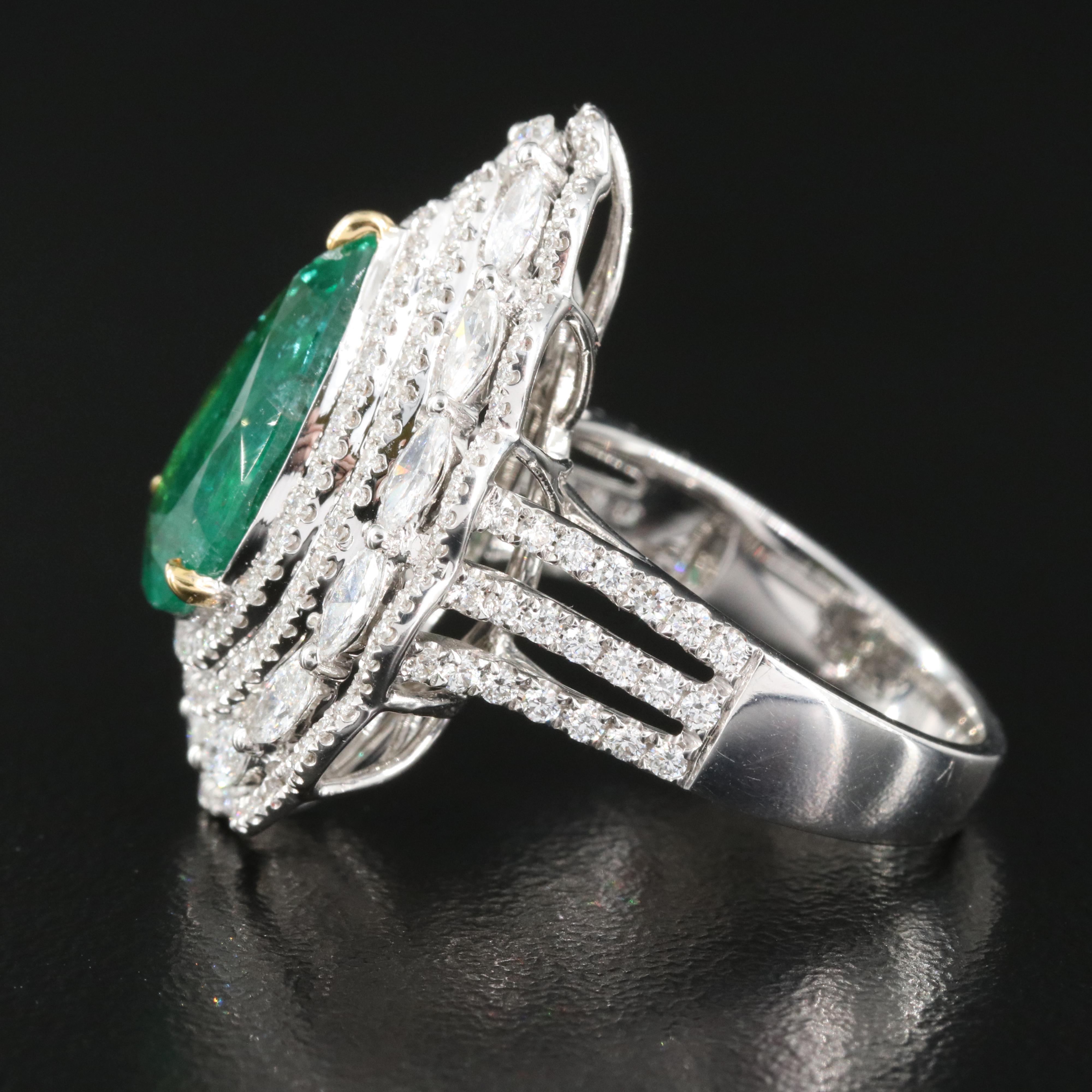 18K 4.53 CT Emerald Teardrop Ring with 1.74 Diamond Scalloped Halo