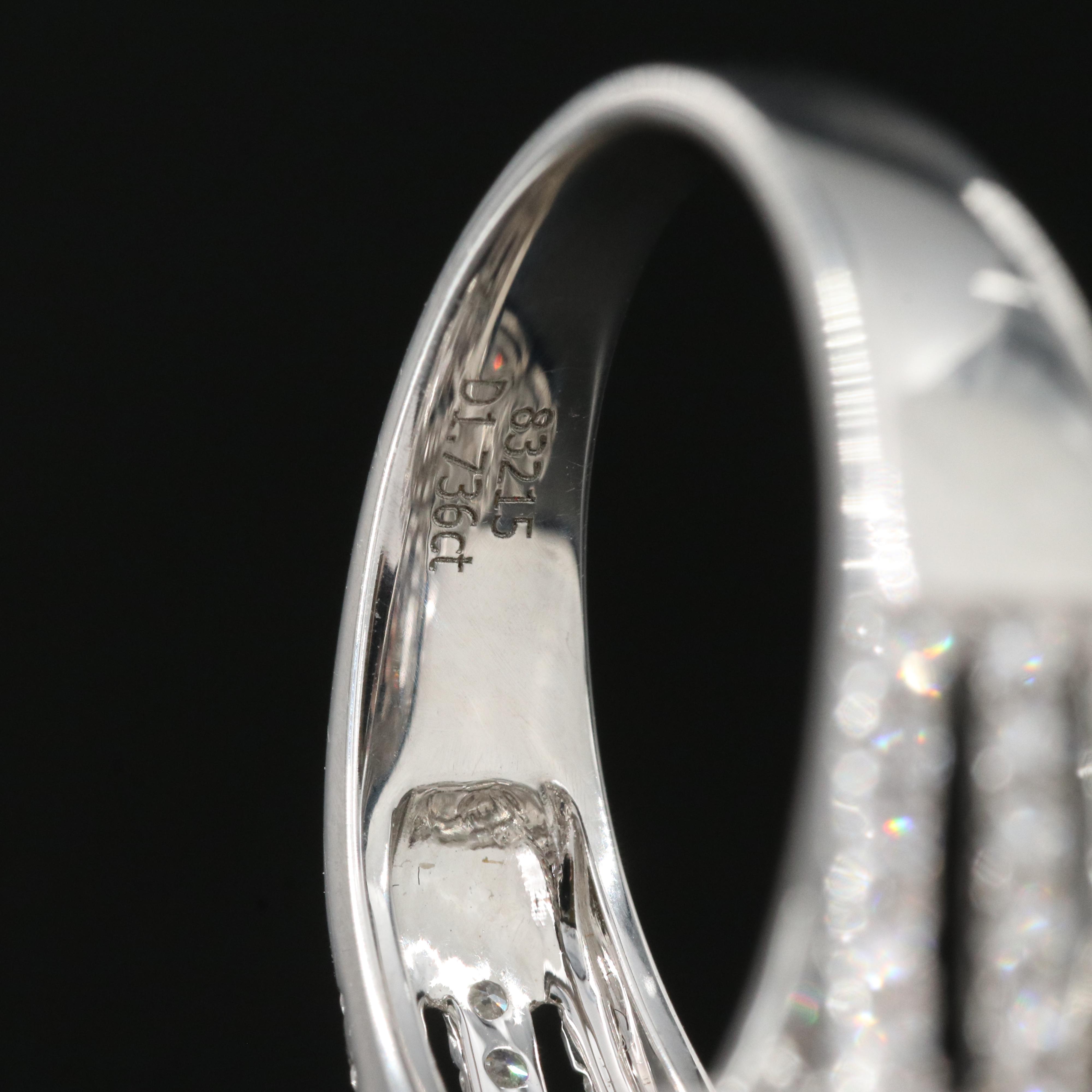 18K 4.53 CT Emerald Teardrop Ring with 1.74 Diamond Scalloped Halo