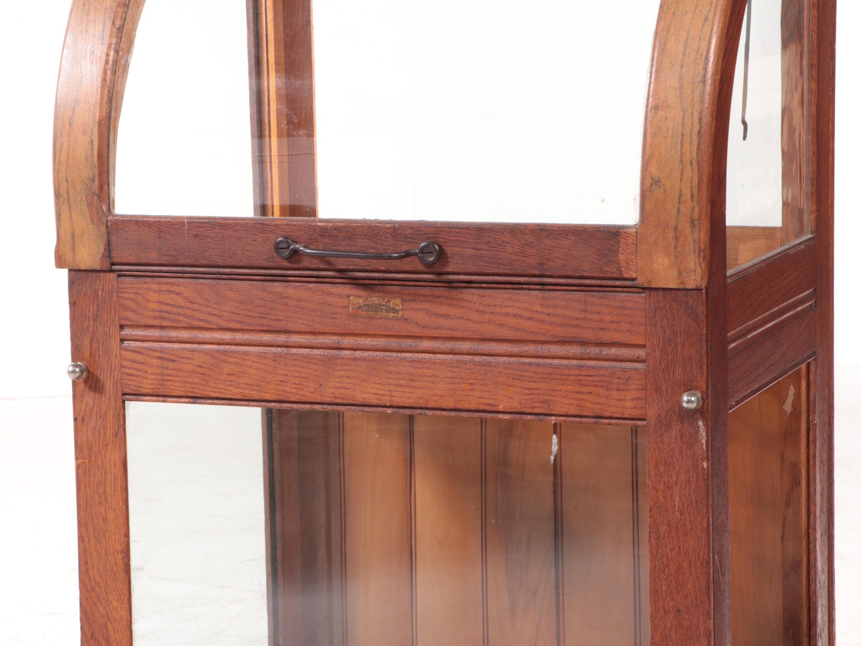 American Oak and Curved Glass Cane Display Case, circa 1900