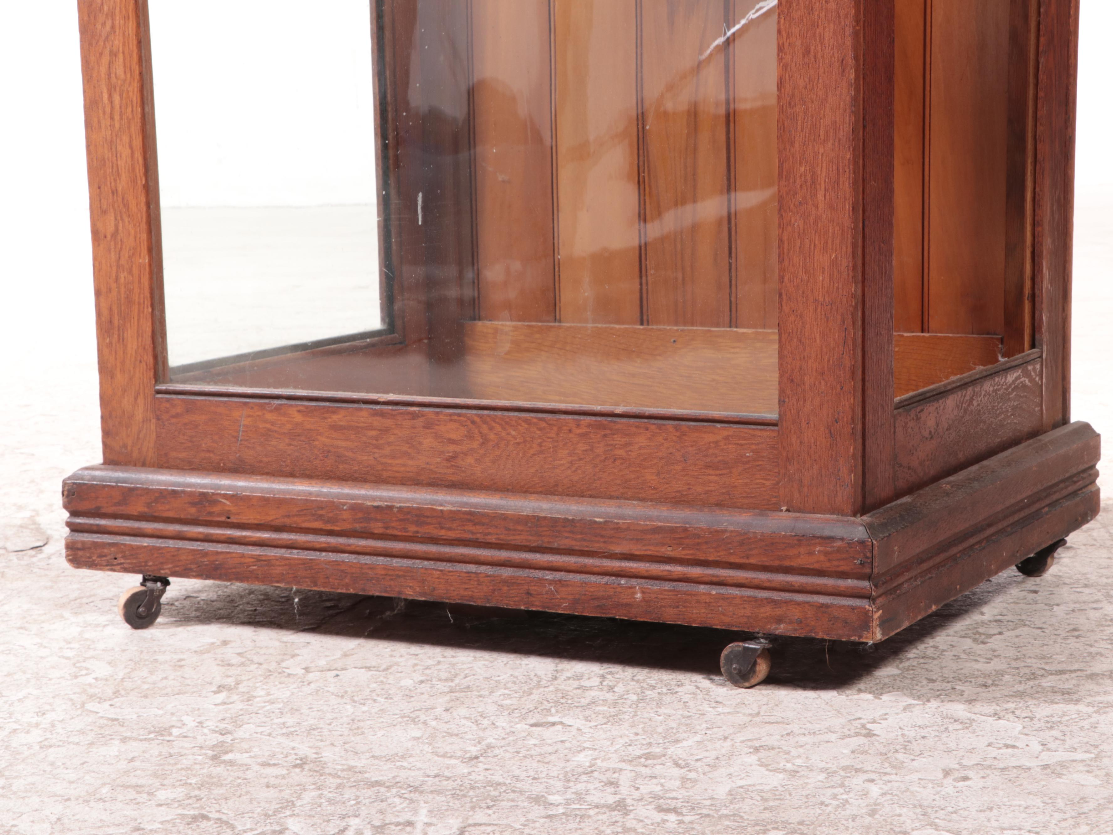 American Oak and Curved Glass Cane Display Case, circa 1900