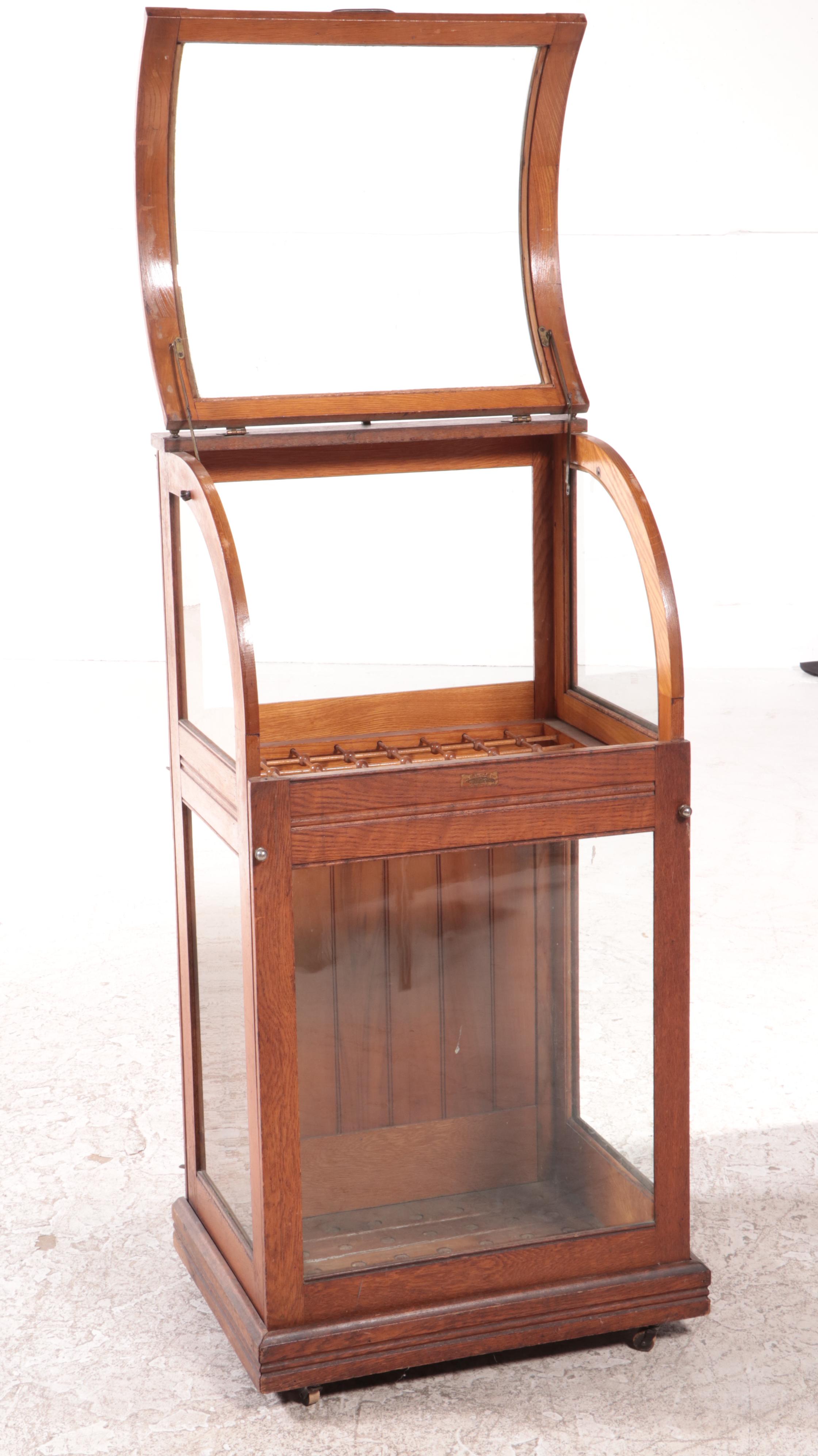 American Oak and Curved Glass Cane Display Case, circa 1900