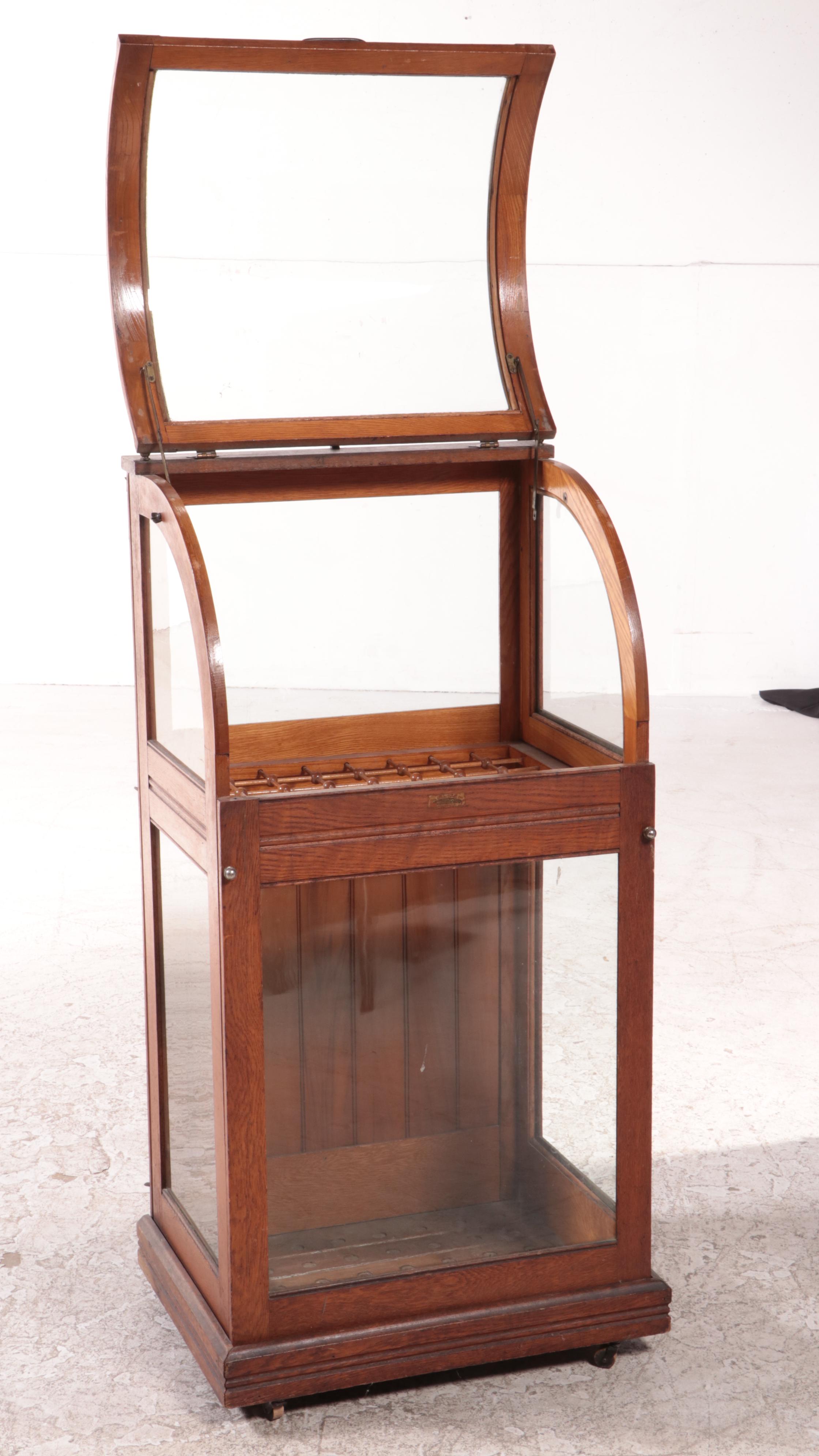 American Oak and Curved Glass Cane Display Case, circa 1900