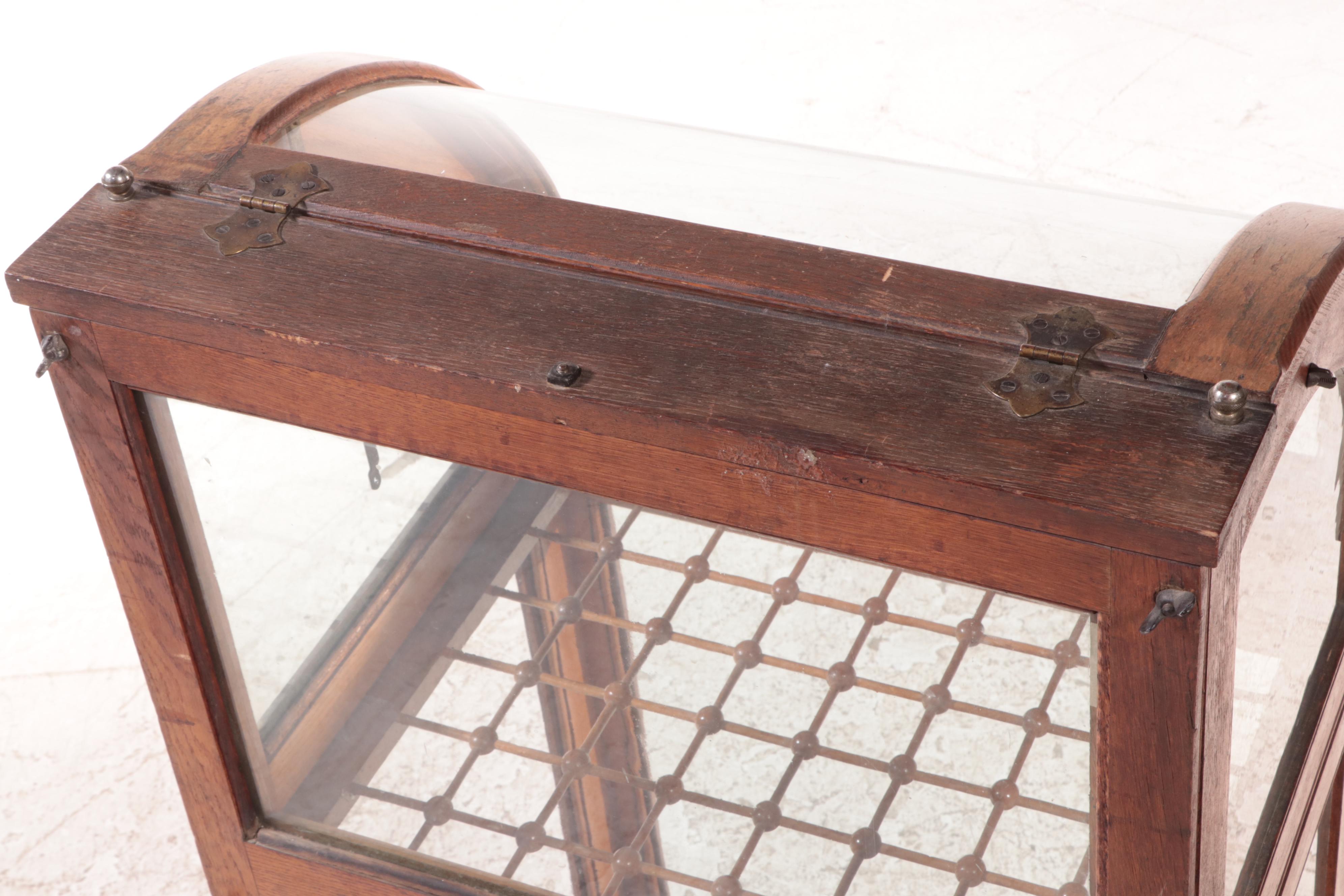 American Oak and Curved Glass Cane Display Case, circa 1900
