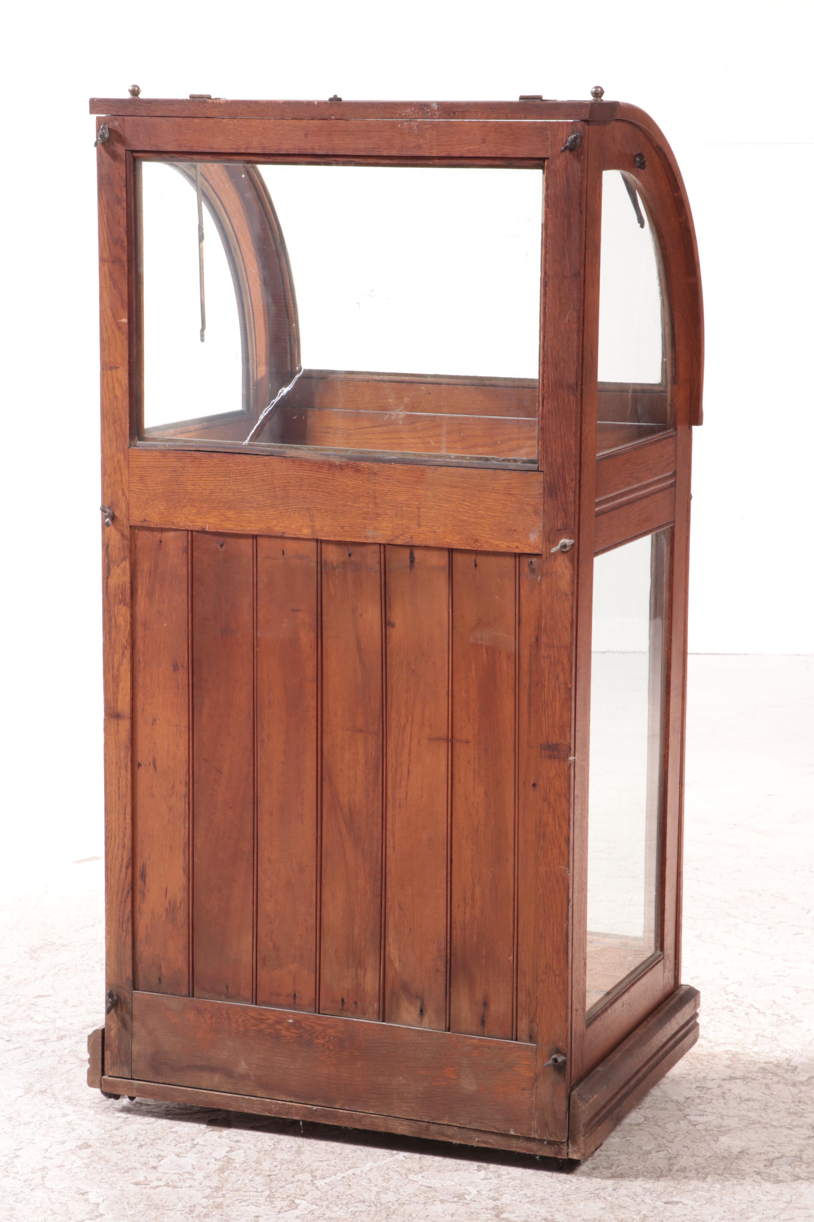 American Oak and Curved Glass Cane Display Case, circa 1900