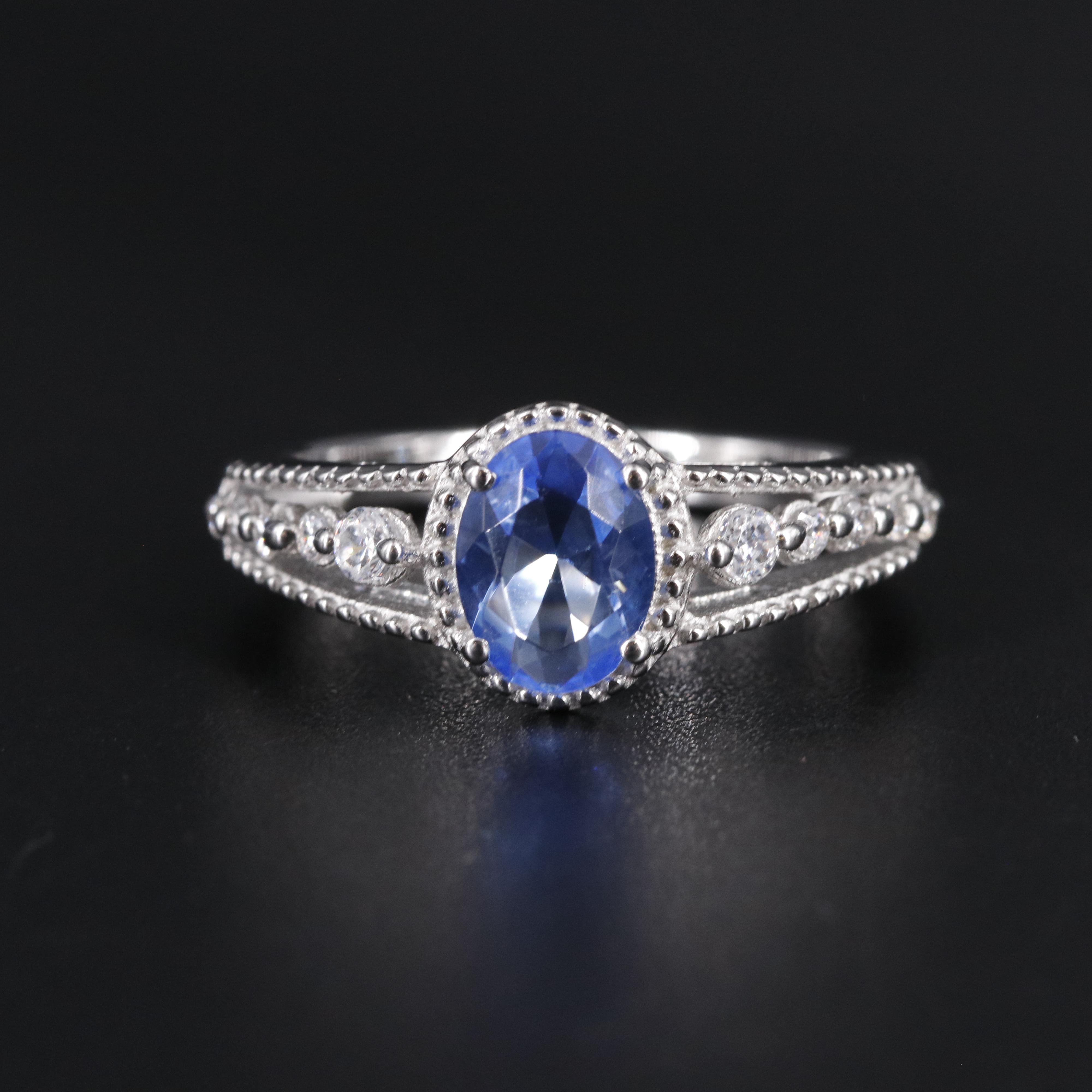 Sterling Silver Topaz and Cubic Zirconia Ring