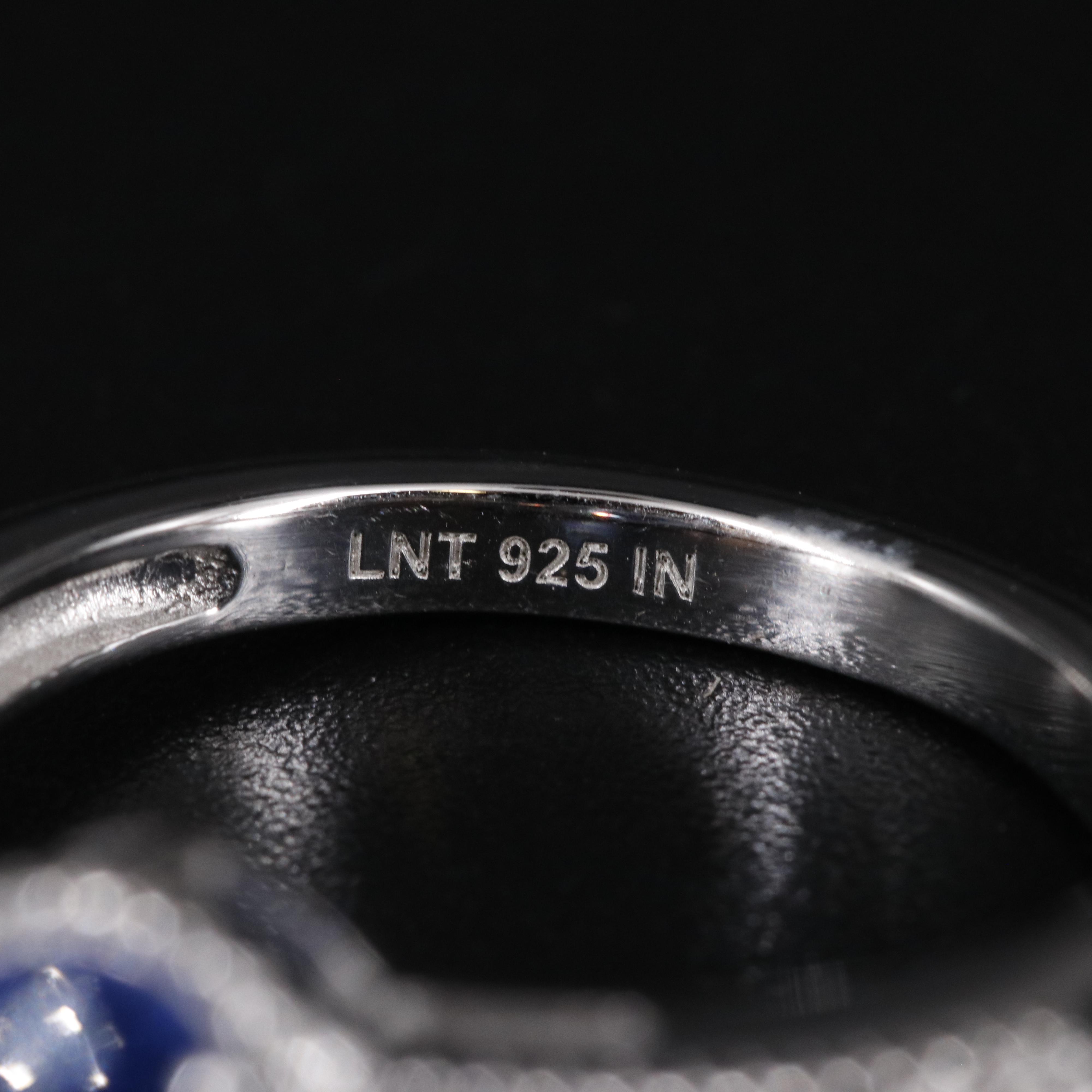 Sterling Silver Topaz and Cubic Zirconia Ring