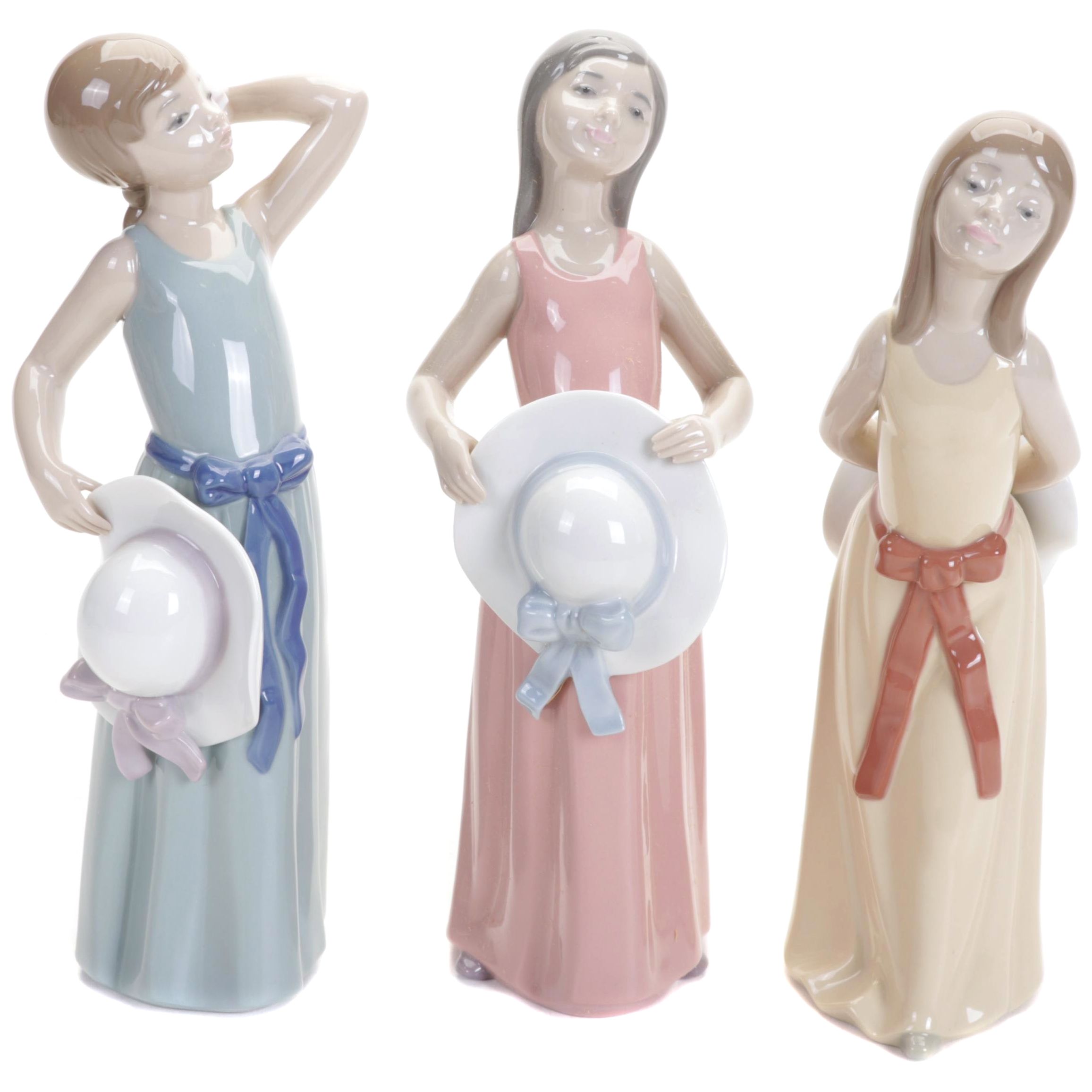 Lladró Porcelain Figurines Including "Coiffure Girl With Straw Hat"