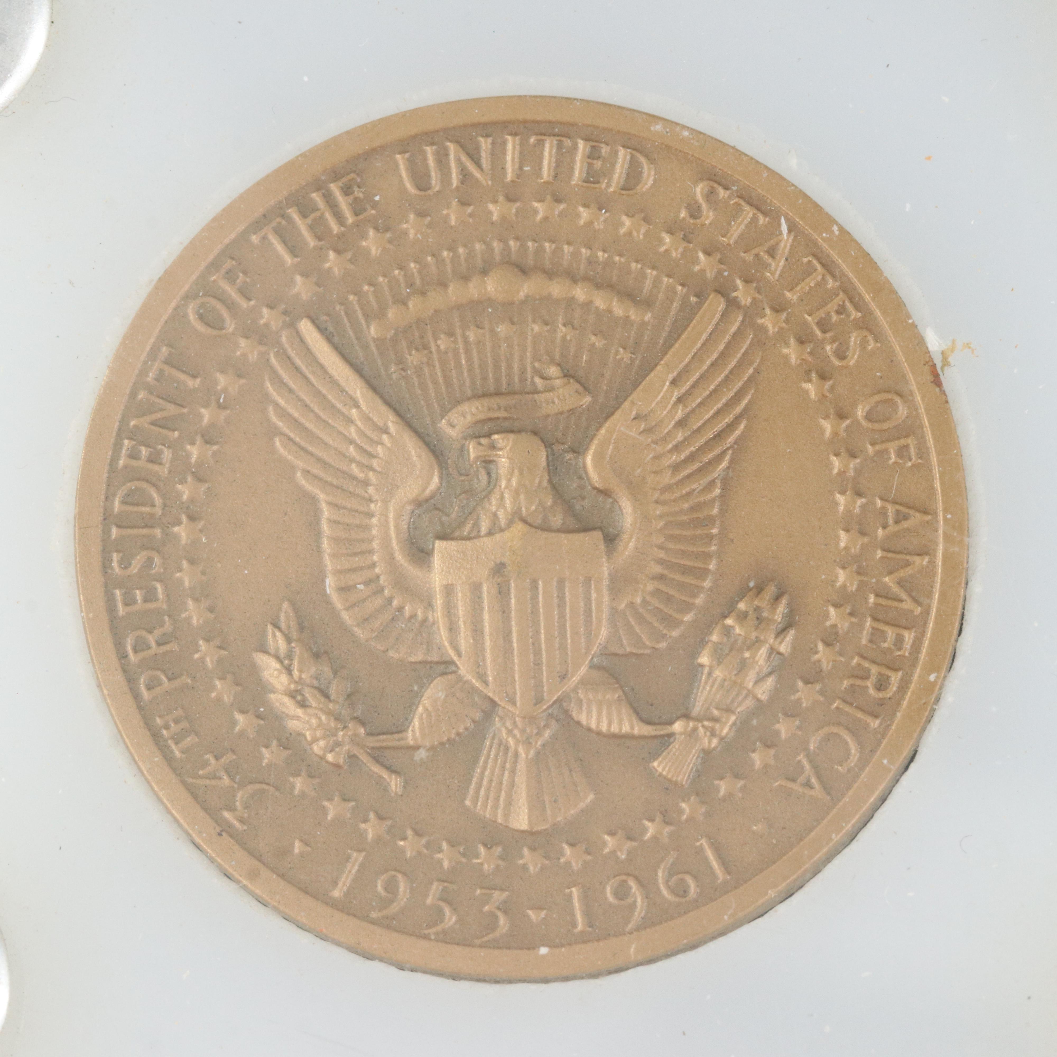 Four Presidential Bronze Medals