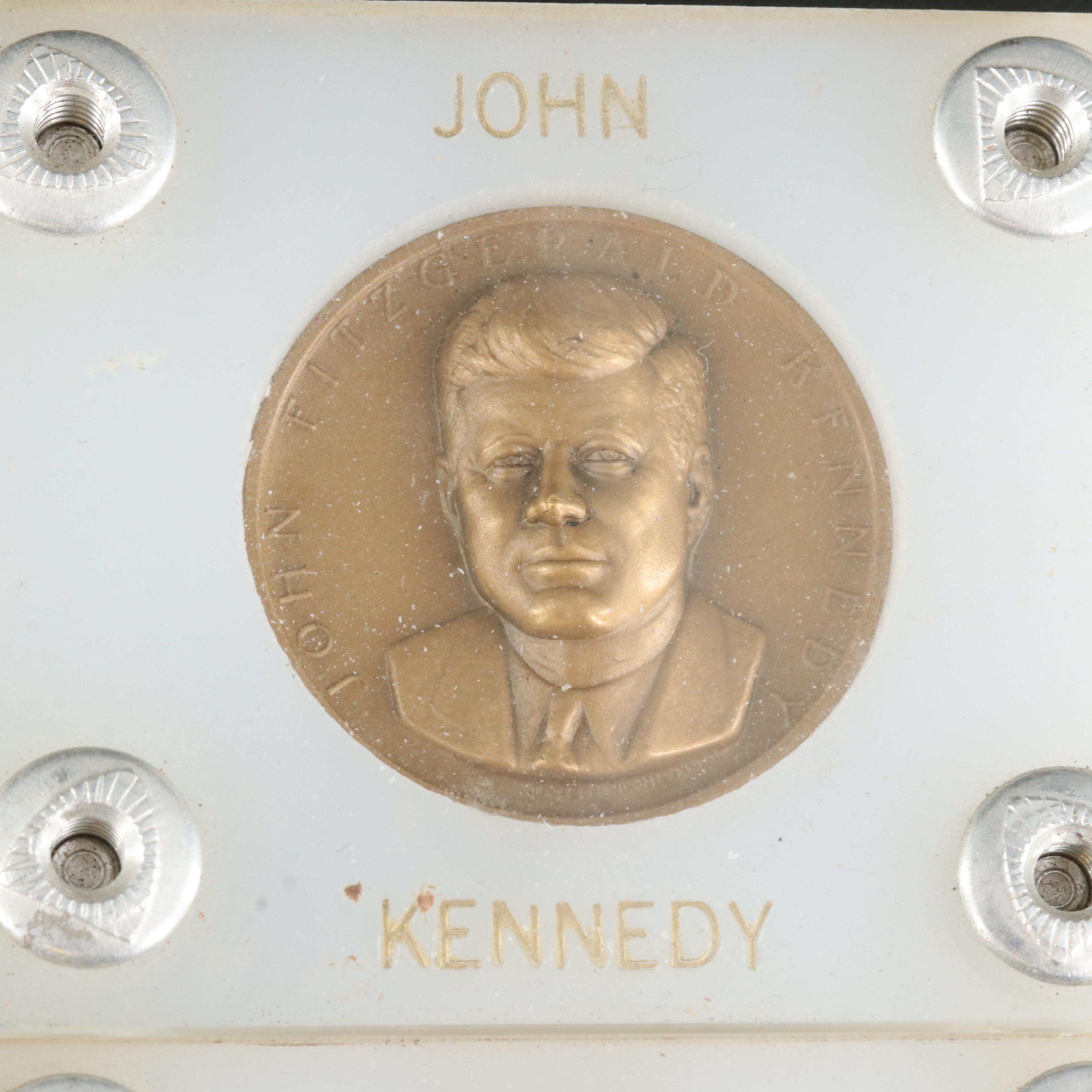 Four Presidential Bronze Medals