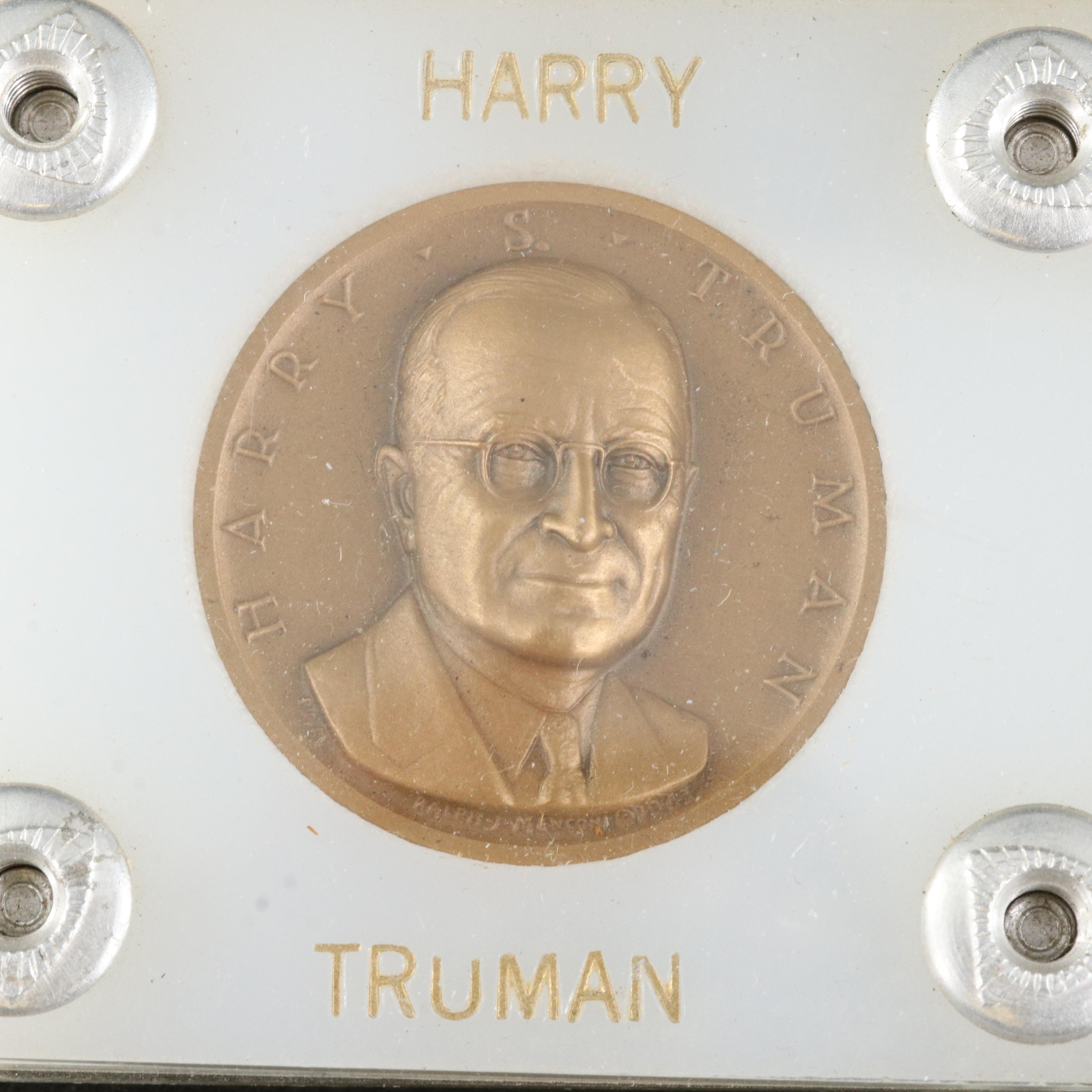 Four Presidential Bronze Medals