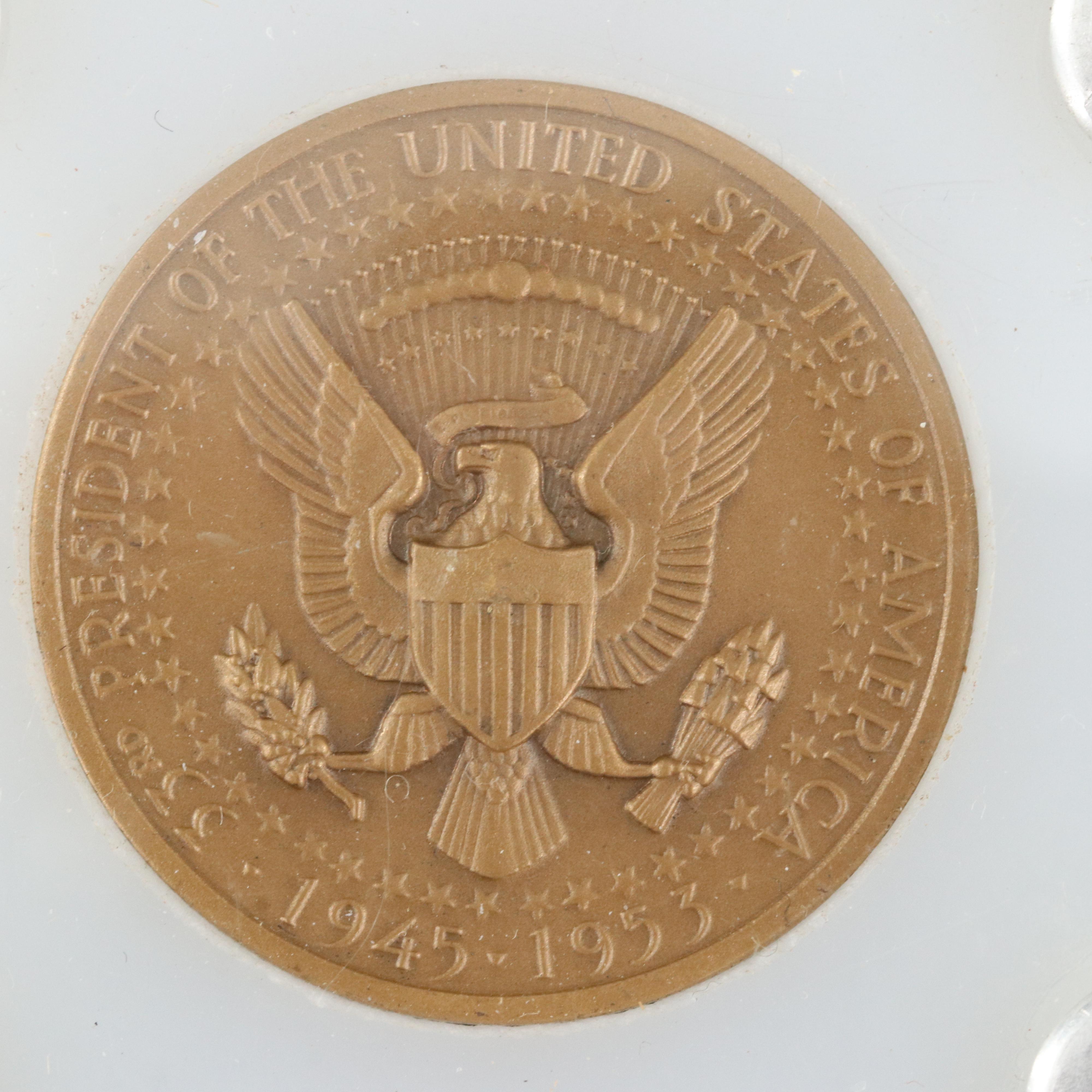 Four Presidential Bronze Medals