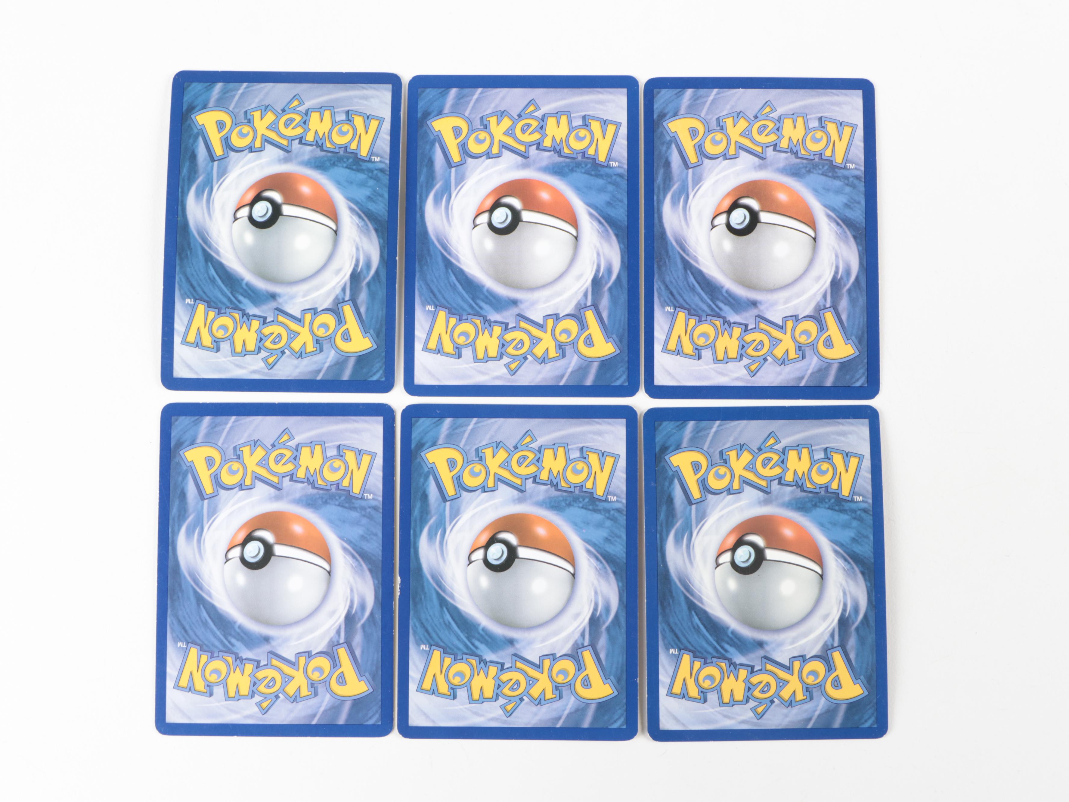 Pokémon Trading Cards Including Lugia, More with Pokémon Essential Handbook