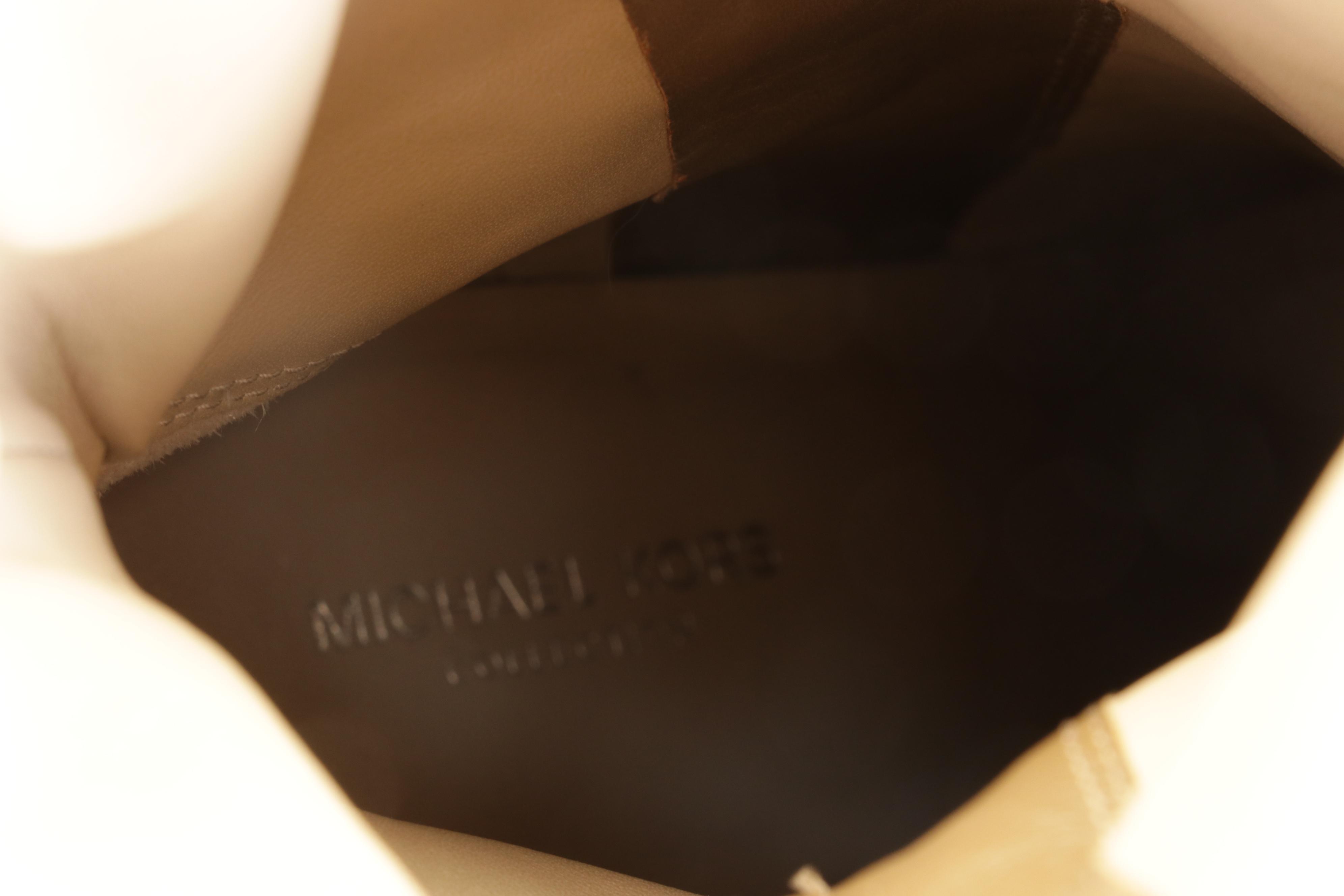 Tory Burch Livia Snakeskin Sandals and Michael Kors Jessa Suede Boots