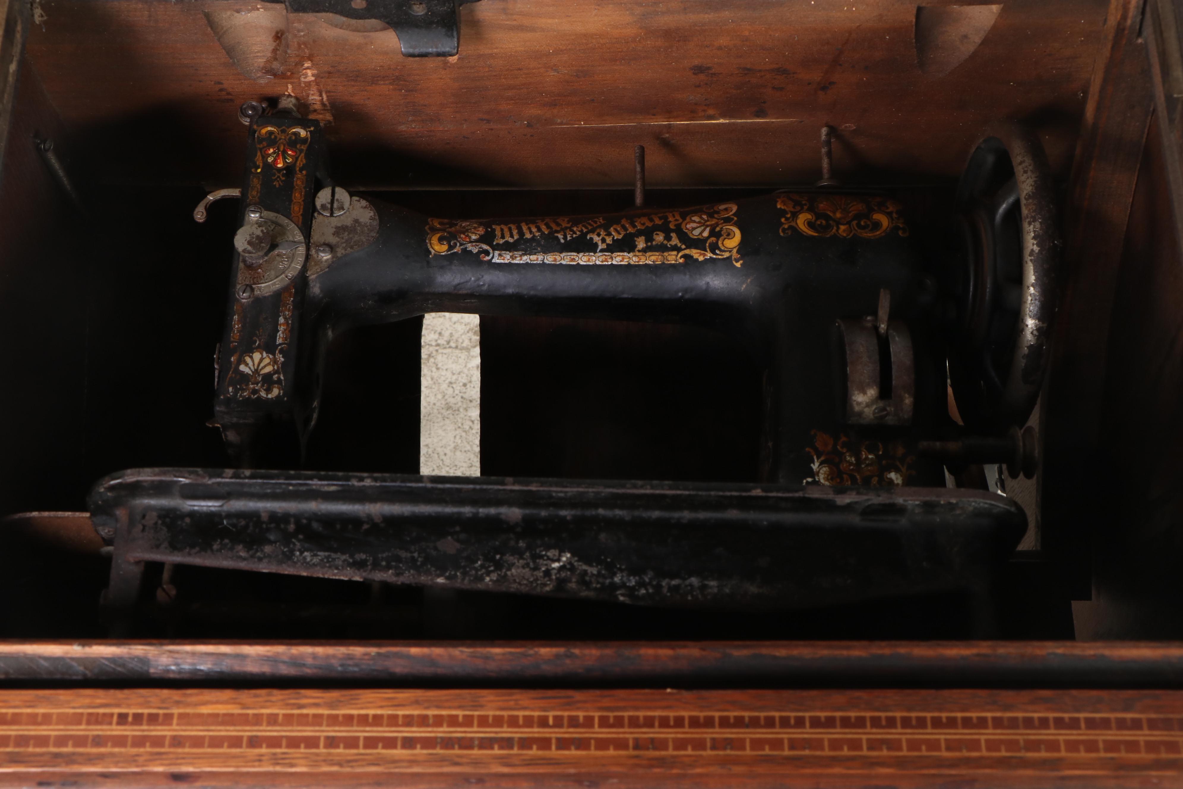 White "Family Rotary" Sewing Machine in Iron and Oak Cabinet, Early 20th Century