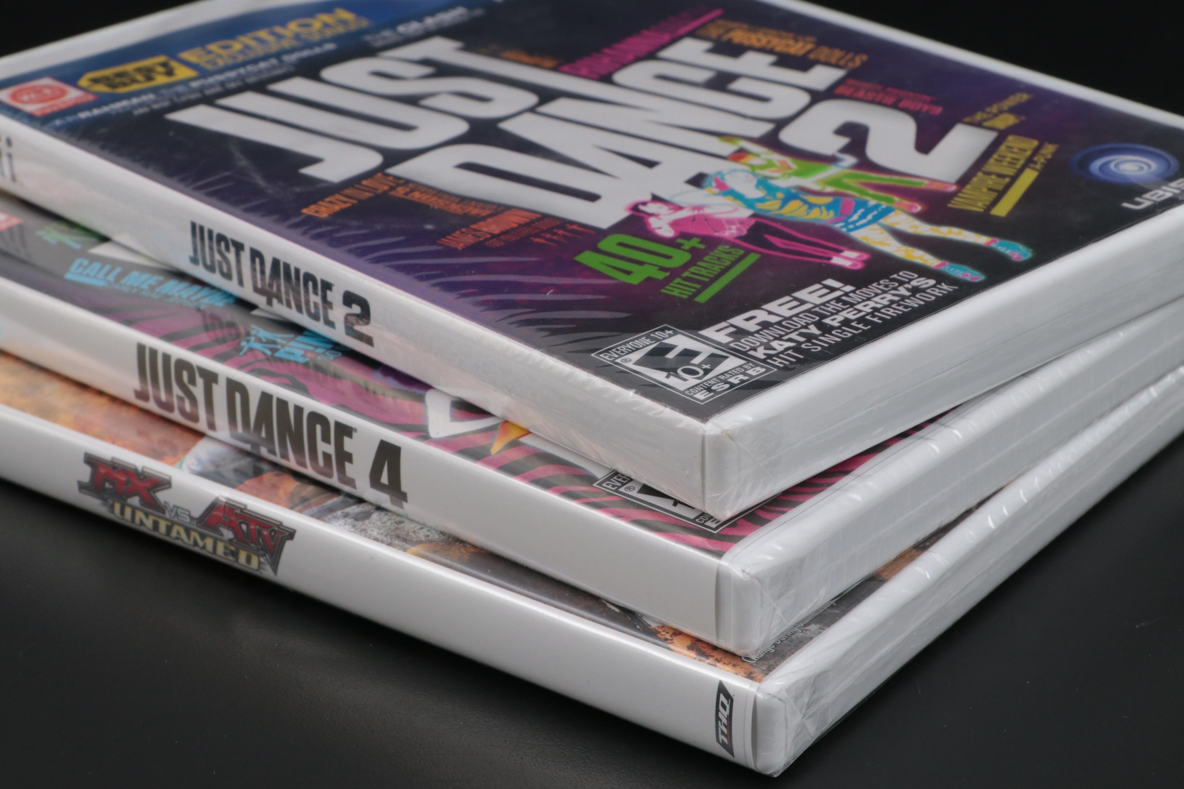 Nintendo Wii Gaming System with Games and Accessories Including Mario Kart, More