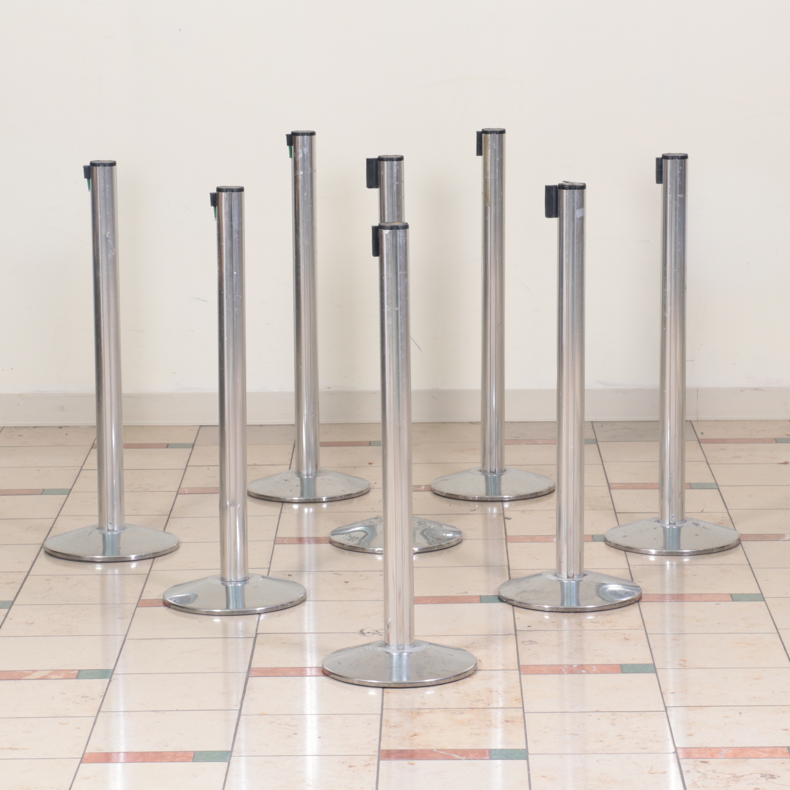 Beltrac Retractable Belt Stanchions with Green and Black Belts