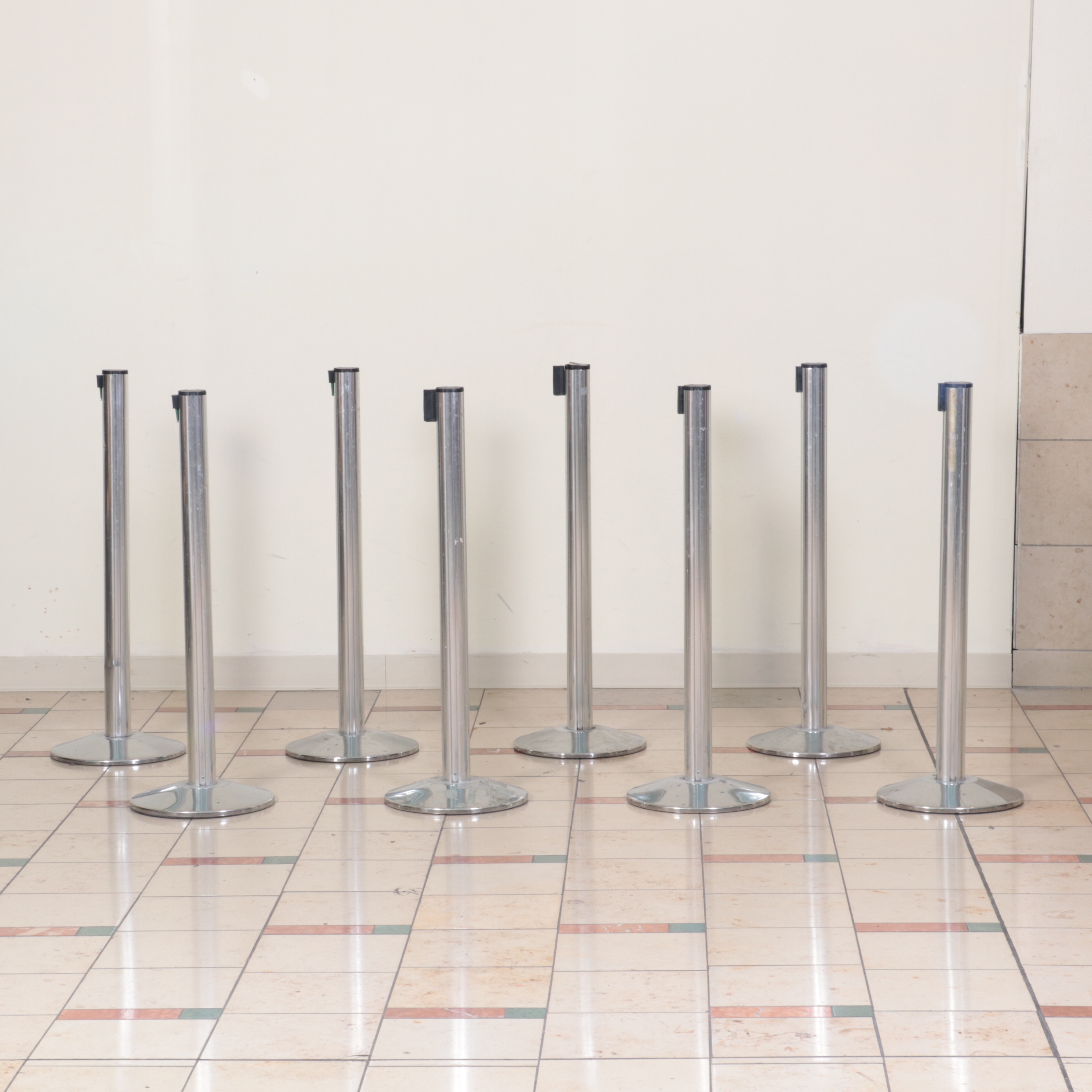 Beltrac Retractable Belt Stanchions with Green and Black Belts