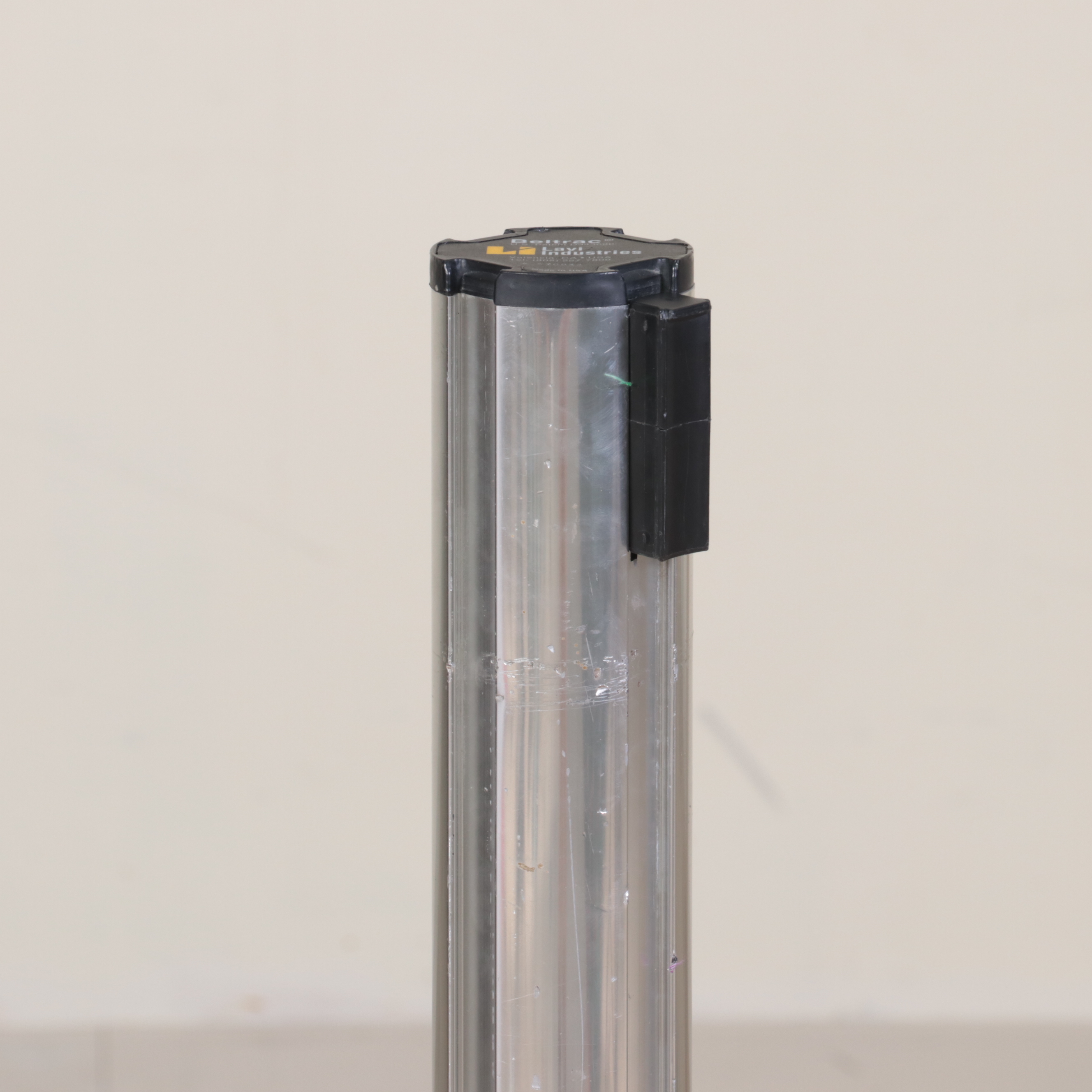 Beltrac Retractable Belt Stanchions with Green and Black Belts