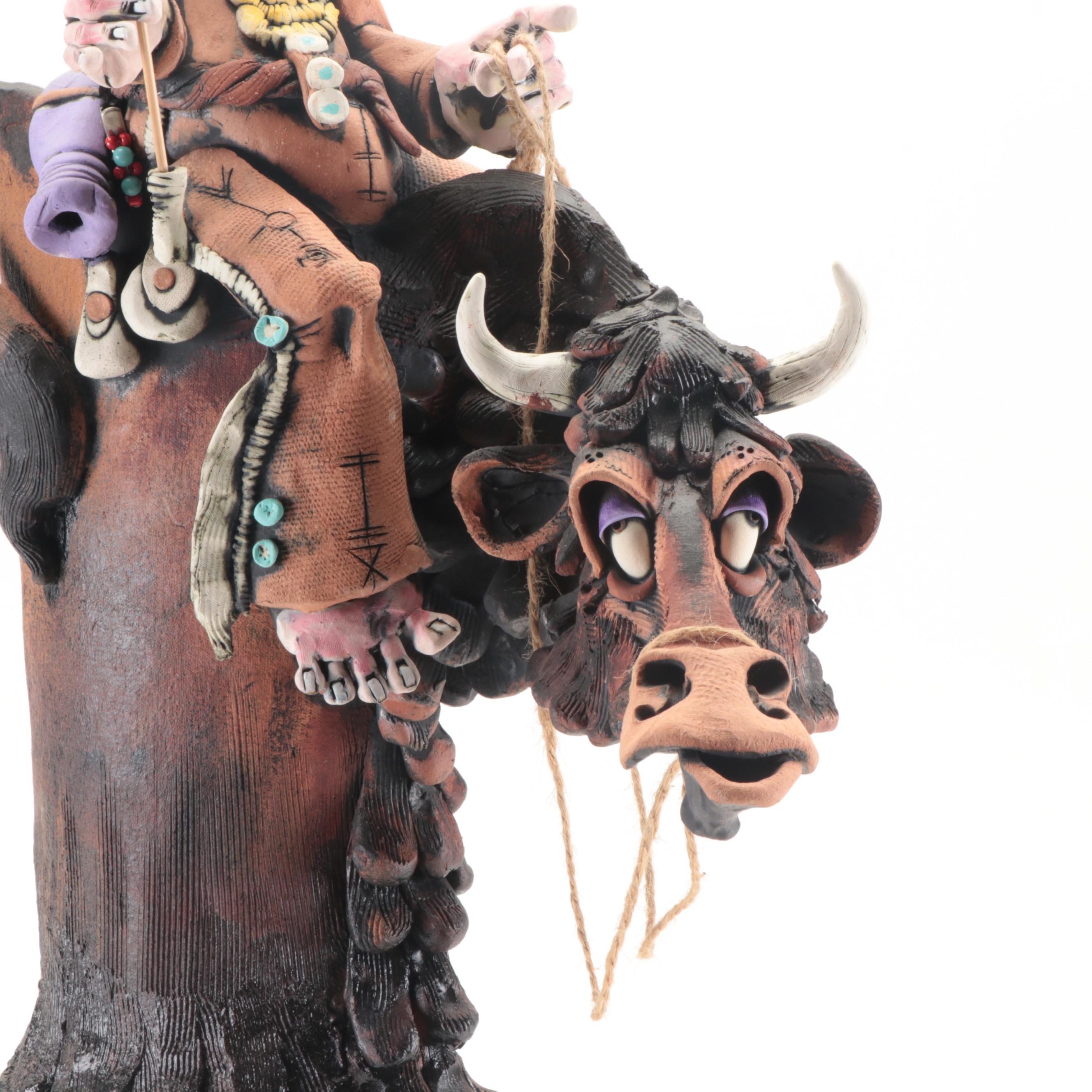Signed Rex Benson Ceramic Native American Riding Buffalo Sculpture