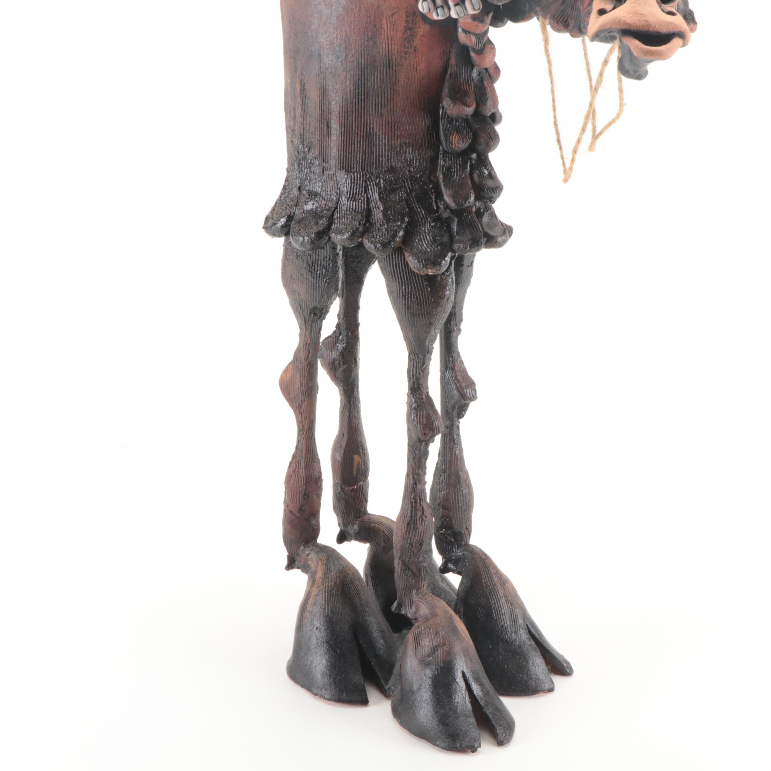 Signed Rex Benson Ceramic Native American Riding Buffalo Sculpture