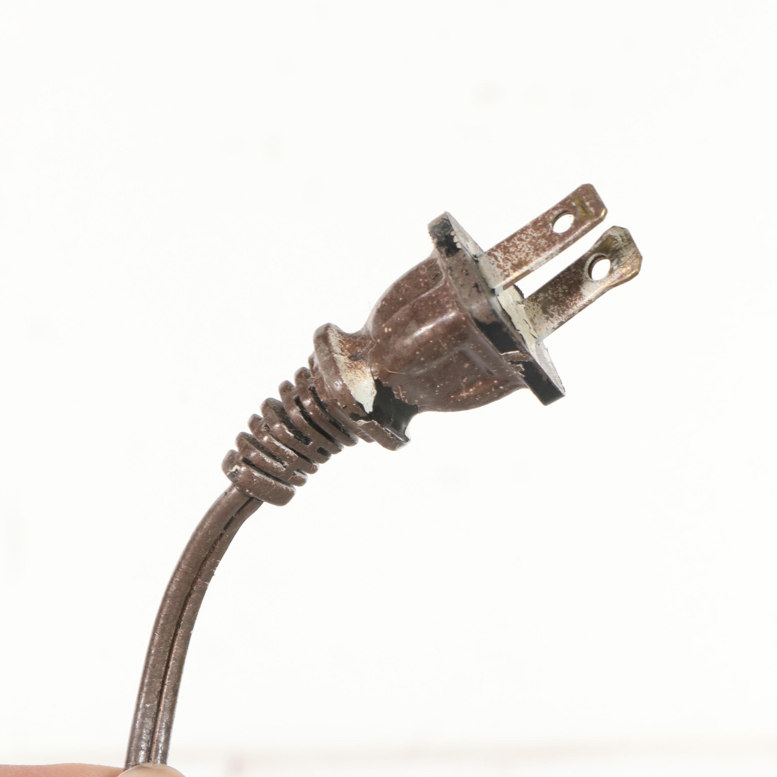 Two Colonial Style Wrought Iron Floor Lamps