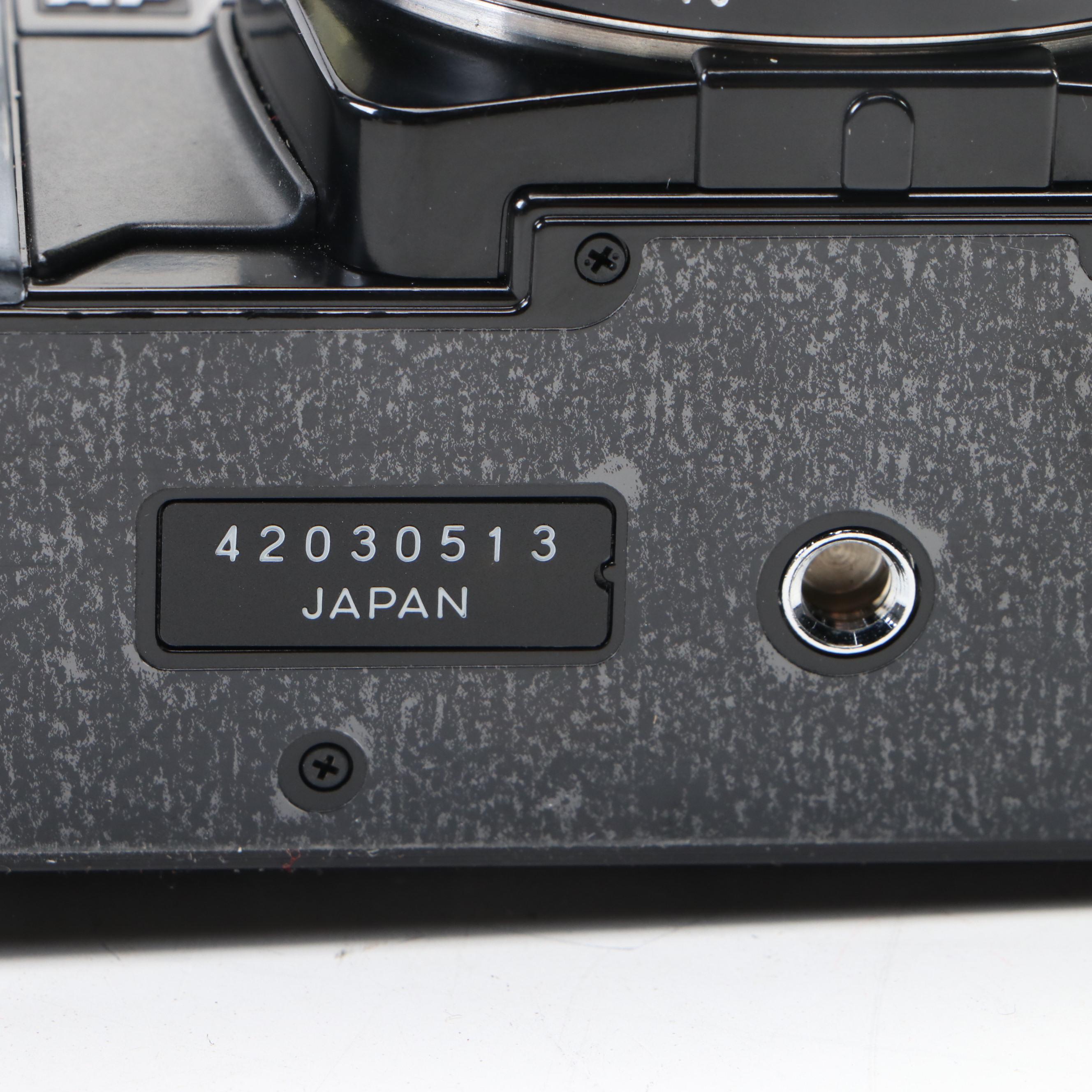 Minolta Maxxum 7000 35mm SLR Camera with 28-85mm Zoom Lens and More