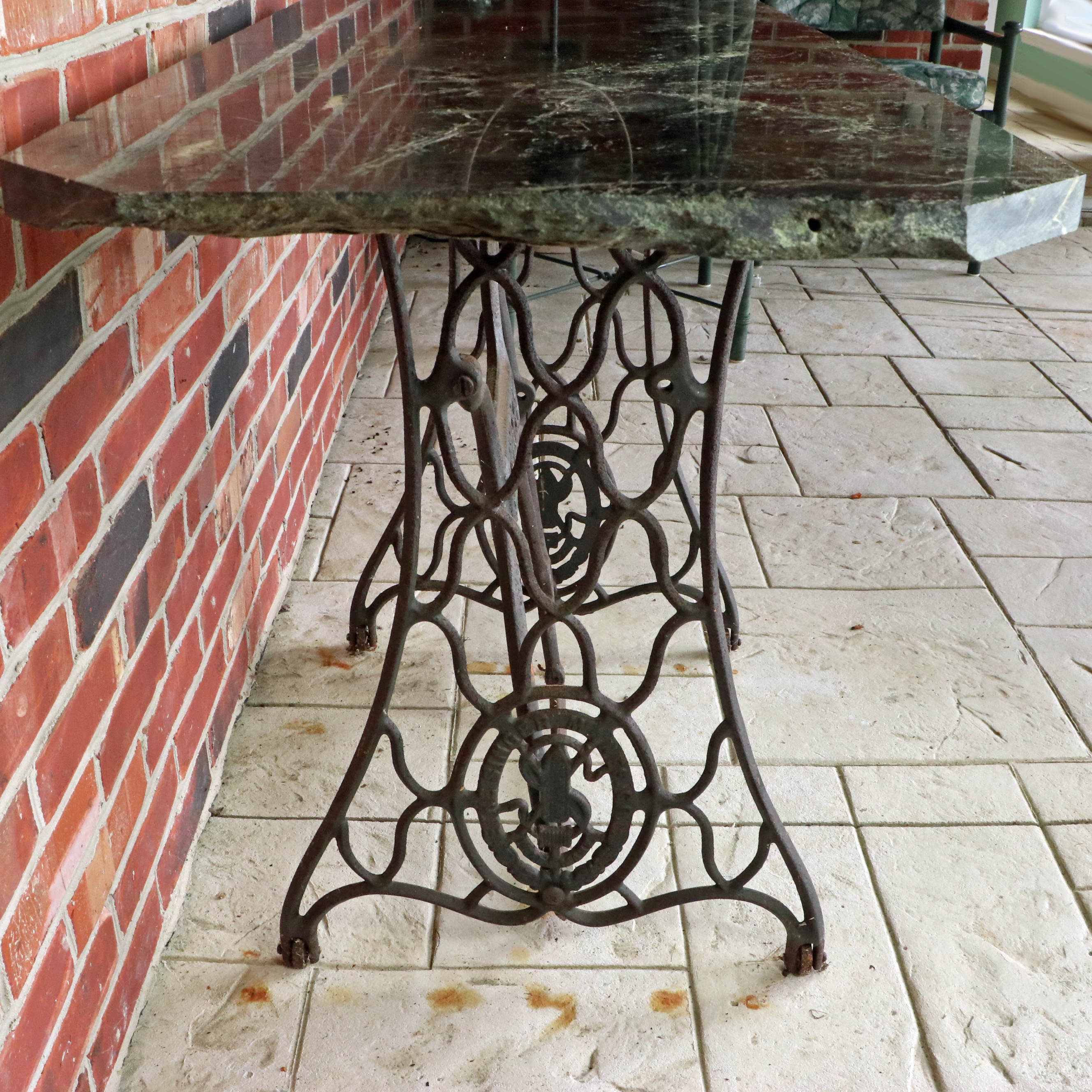 Green Marble Slab Table with Singer Cast Iron Treadle Base