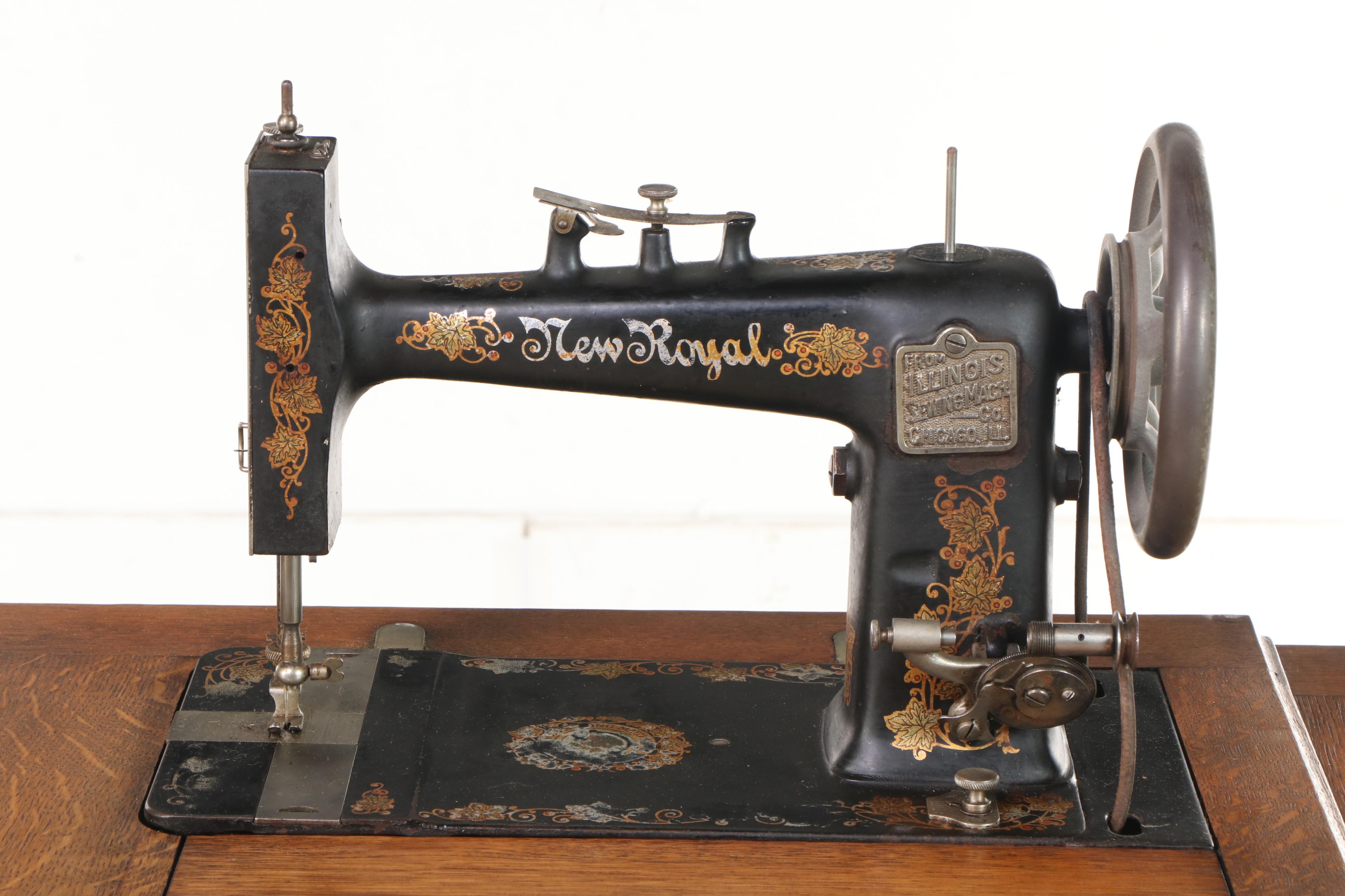 Illinois Sewing Machine Co. "New Royal" Oak and Cast Iron Treadle Sewing Machine