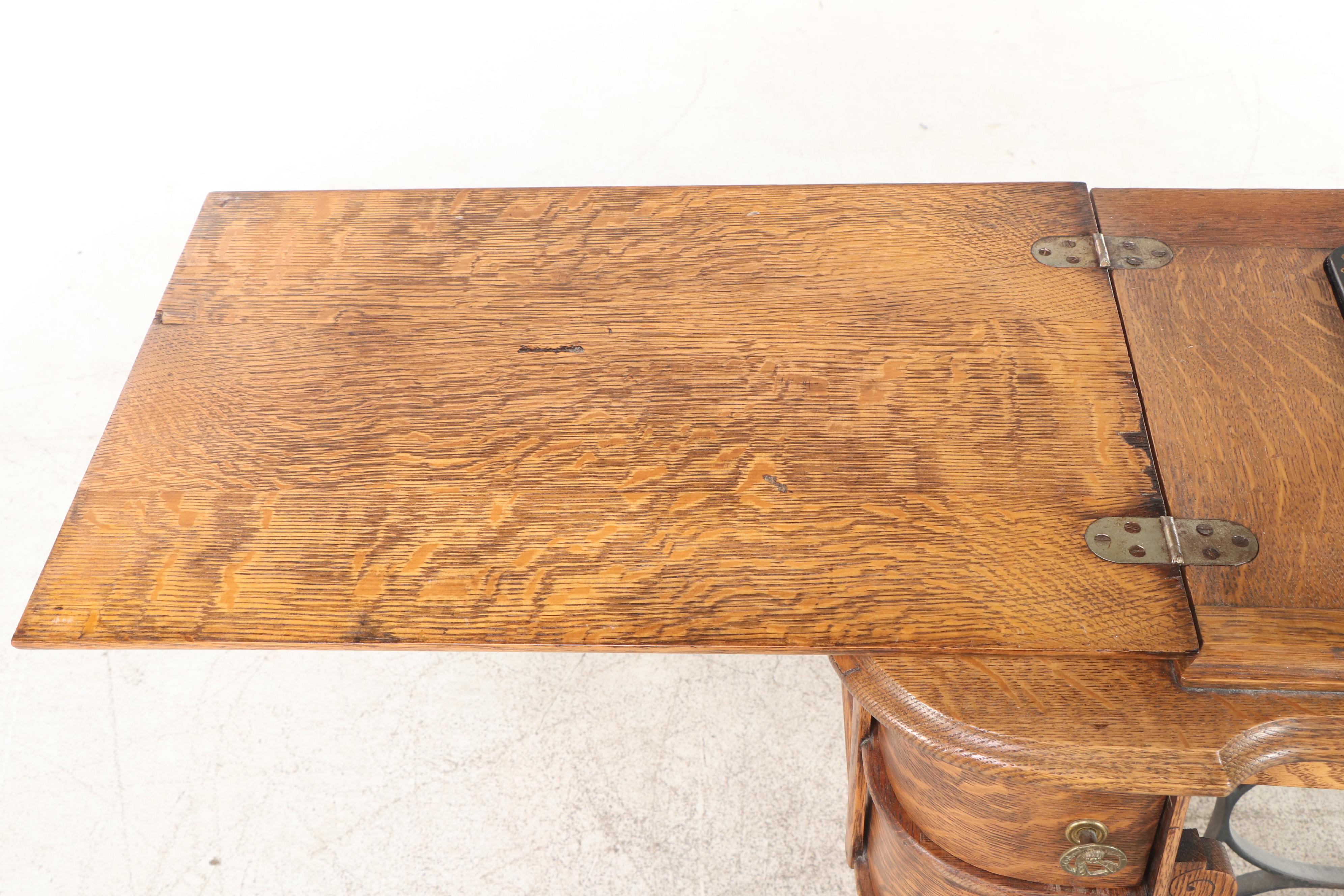 Illinois Sewing Machine Co. "New Royal" Oak and Cast Iron Treadle Sewing Machine