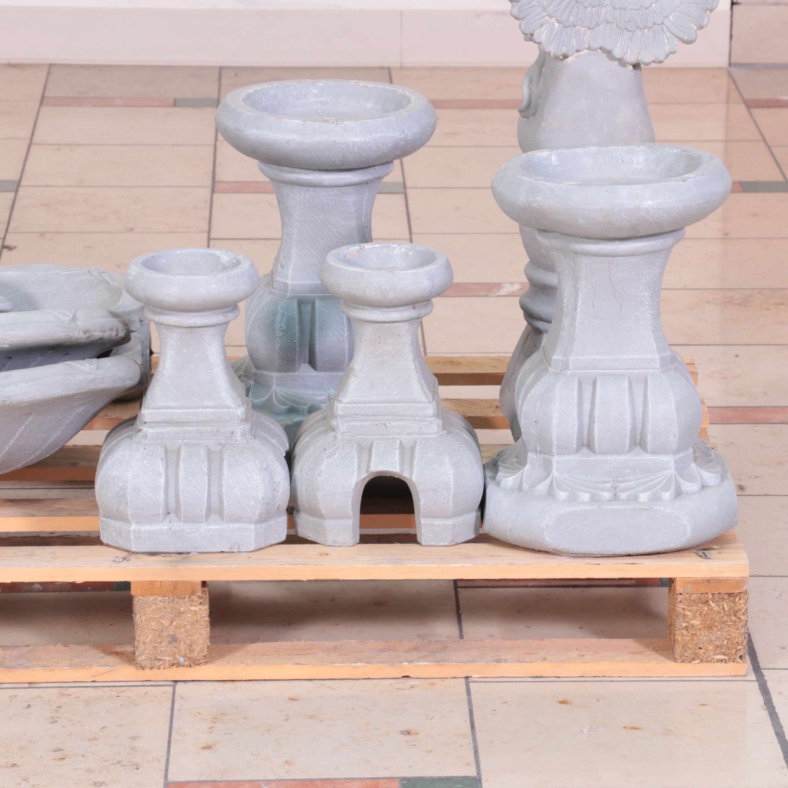 Three-Tiered Water Fountain With Cupid and Other Garden Décor