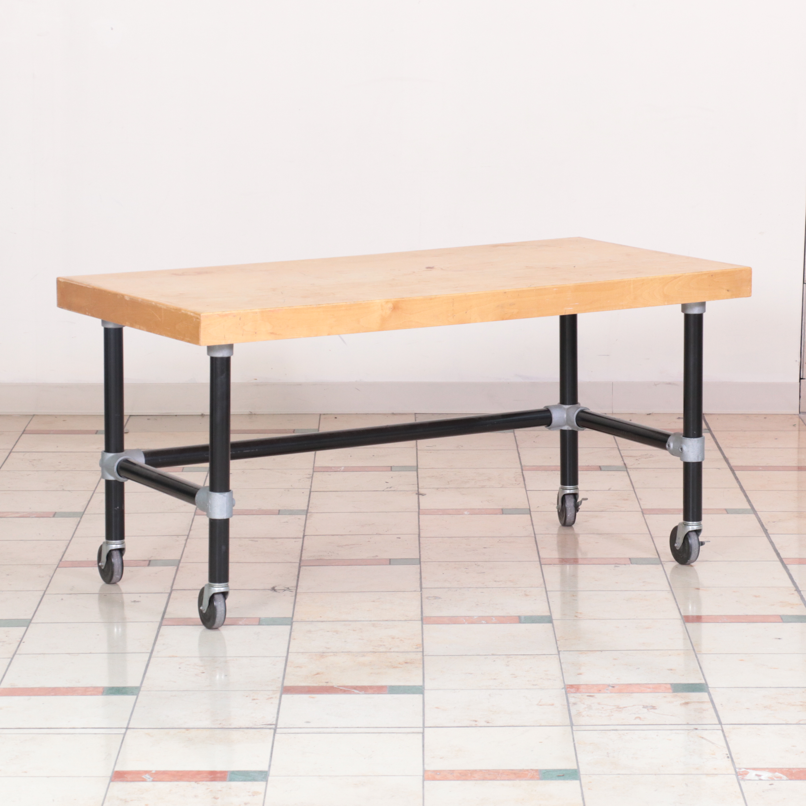 Three Metal and Wood-Veneered Top Rolling Retail Display Tables