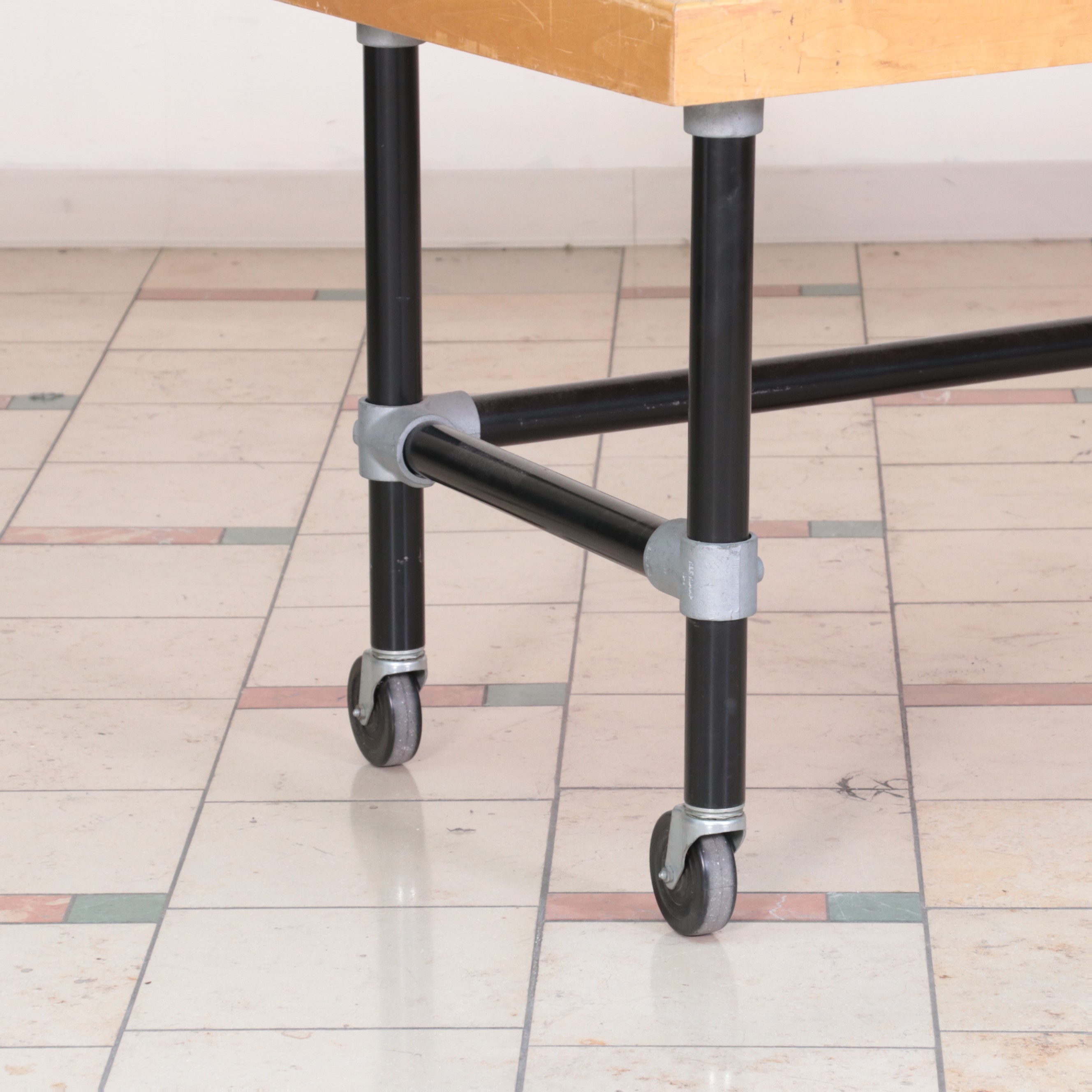 Three Metal and Wood-Veneered Top Rolling Retail Display Tables