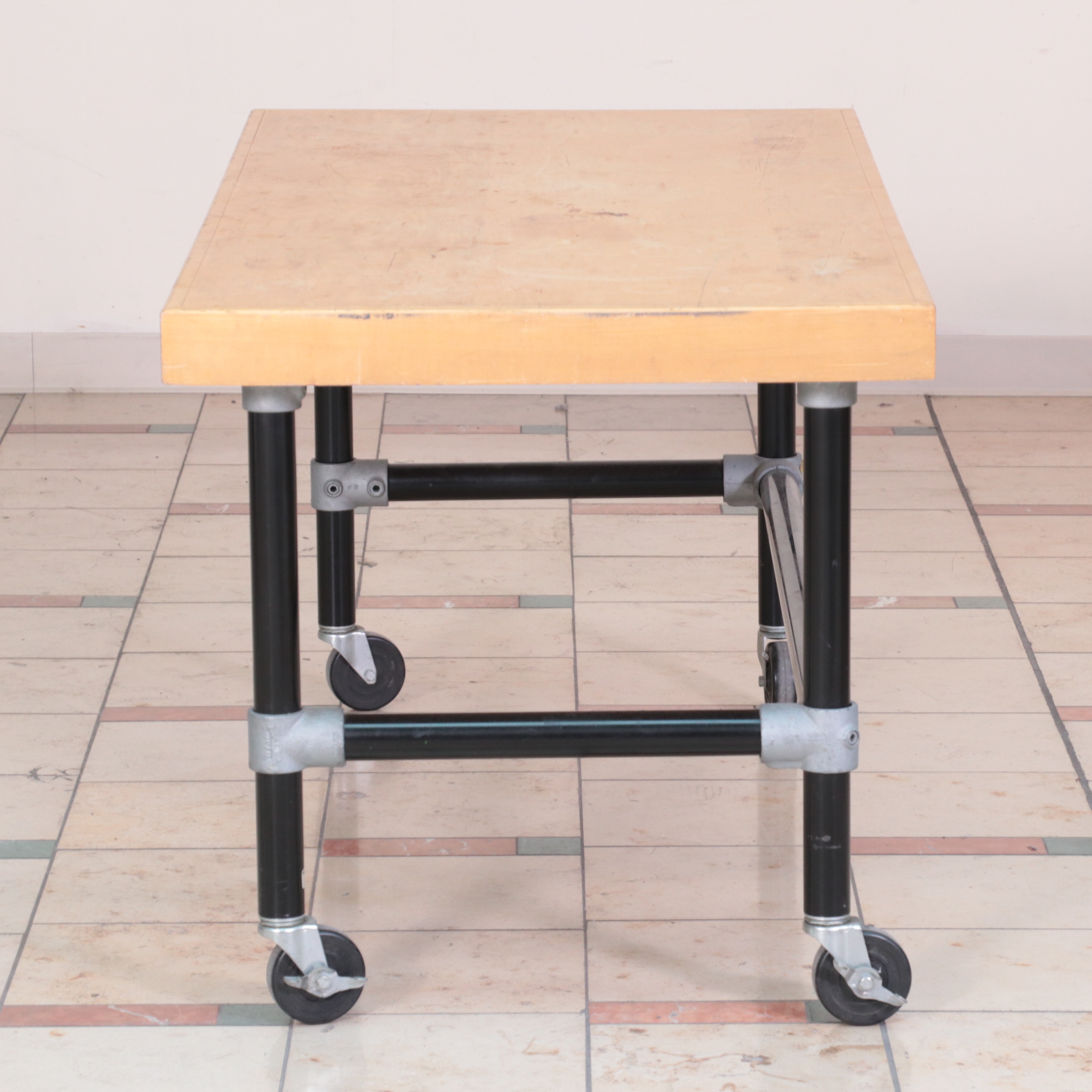 Three Metal and Wood-Veneered Top Rolling Retail Display Tables