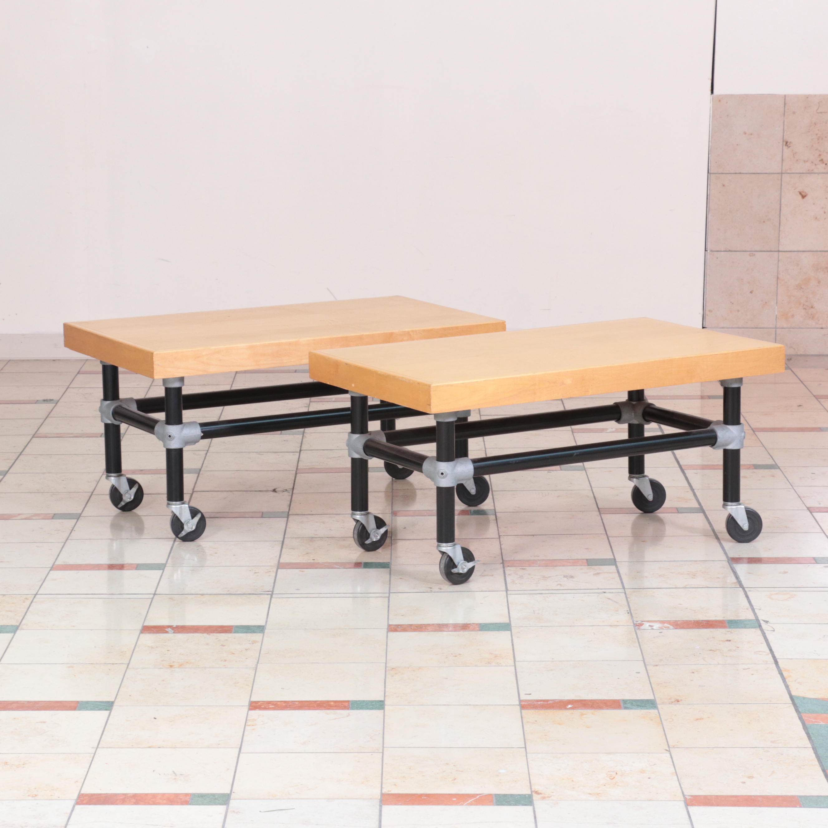 Three Metal and Wood-Veneered Top Rolling Retail Display Tables