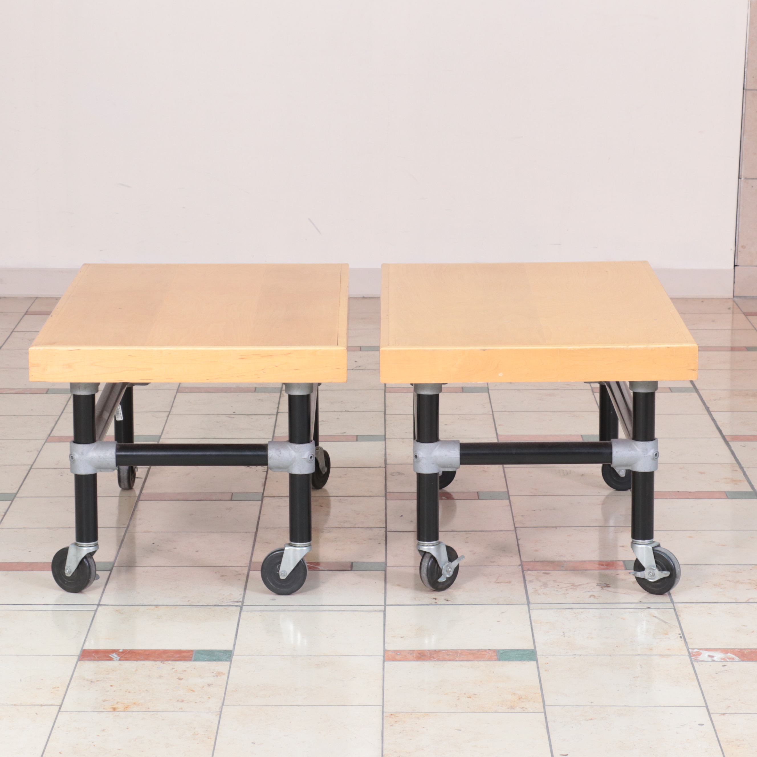 Three Metal and Wood-Veneered Top Rolling Retail Display Tables