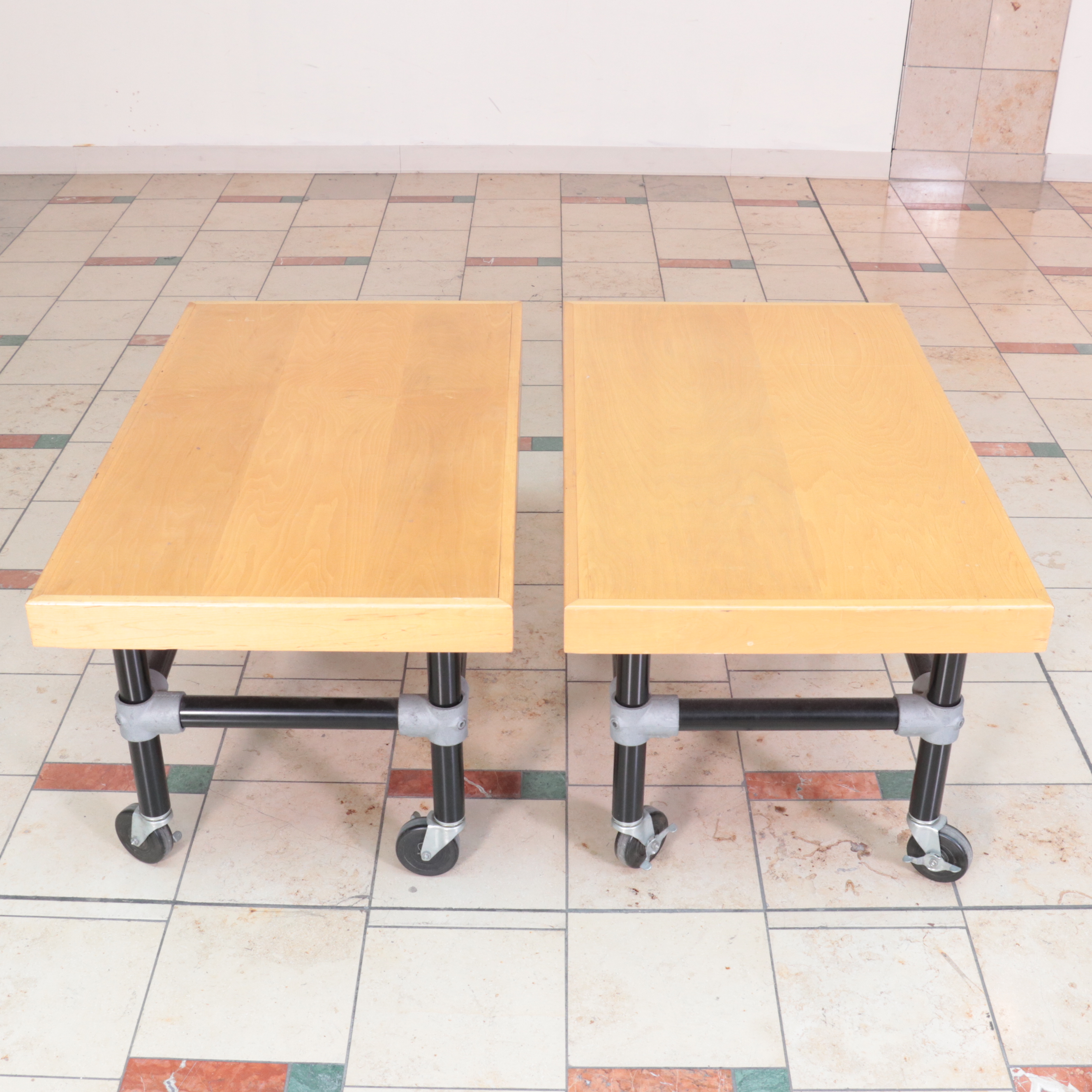 Three Metal and Wood-Veneered Top Rolling Retail Display Tables