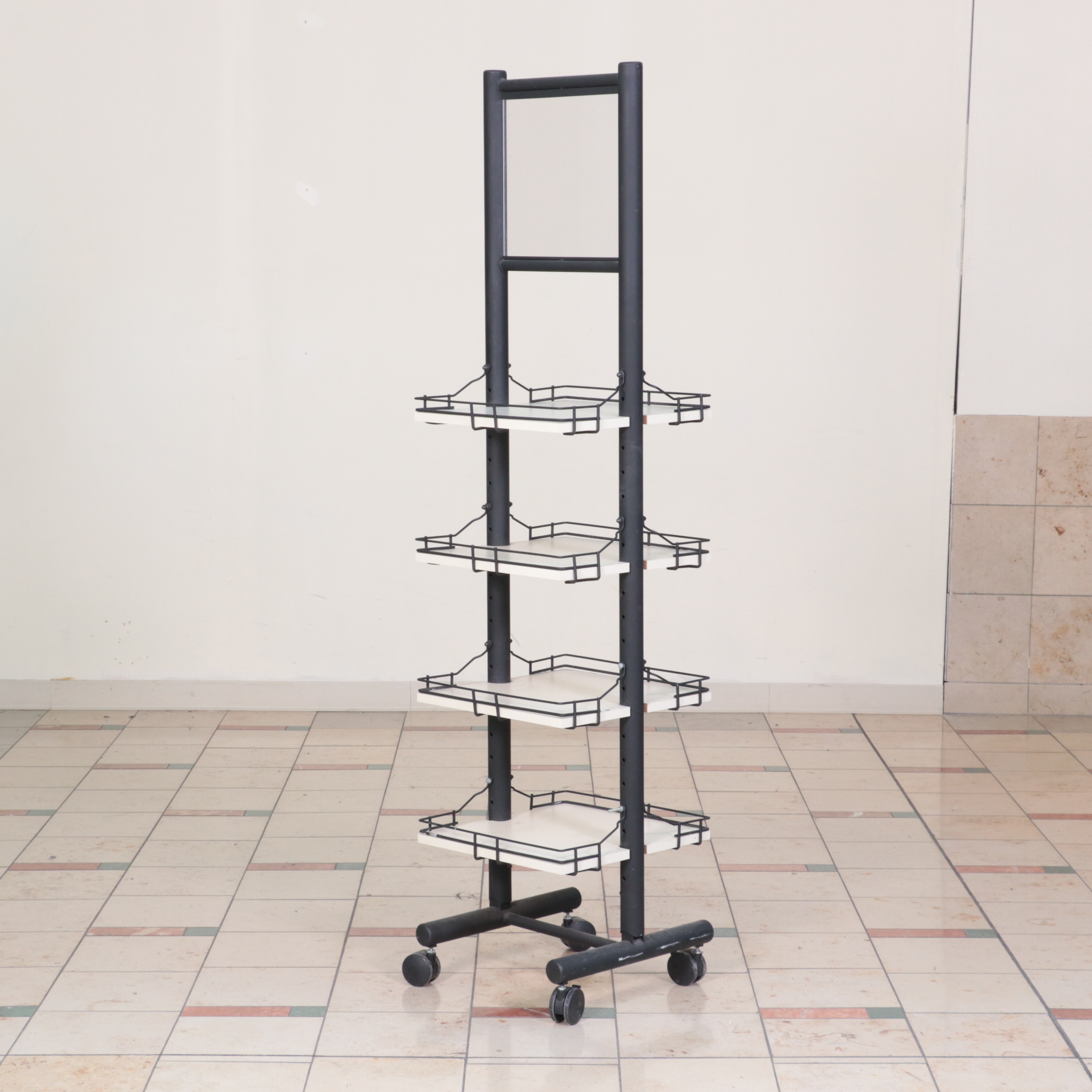Three Metal Rolling Clothing Display Racks