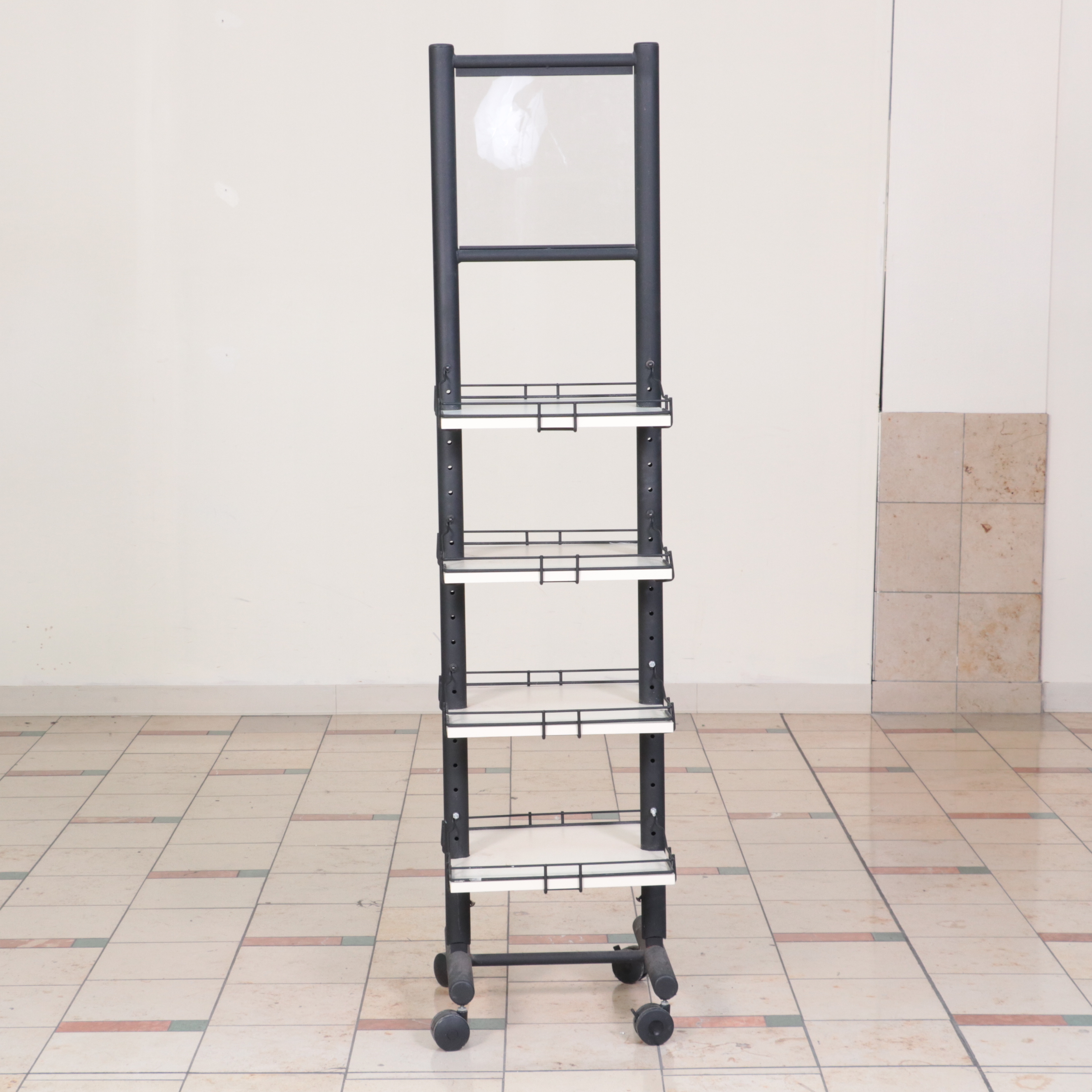 Three Metal Rolling Clothing Display Racks