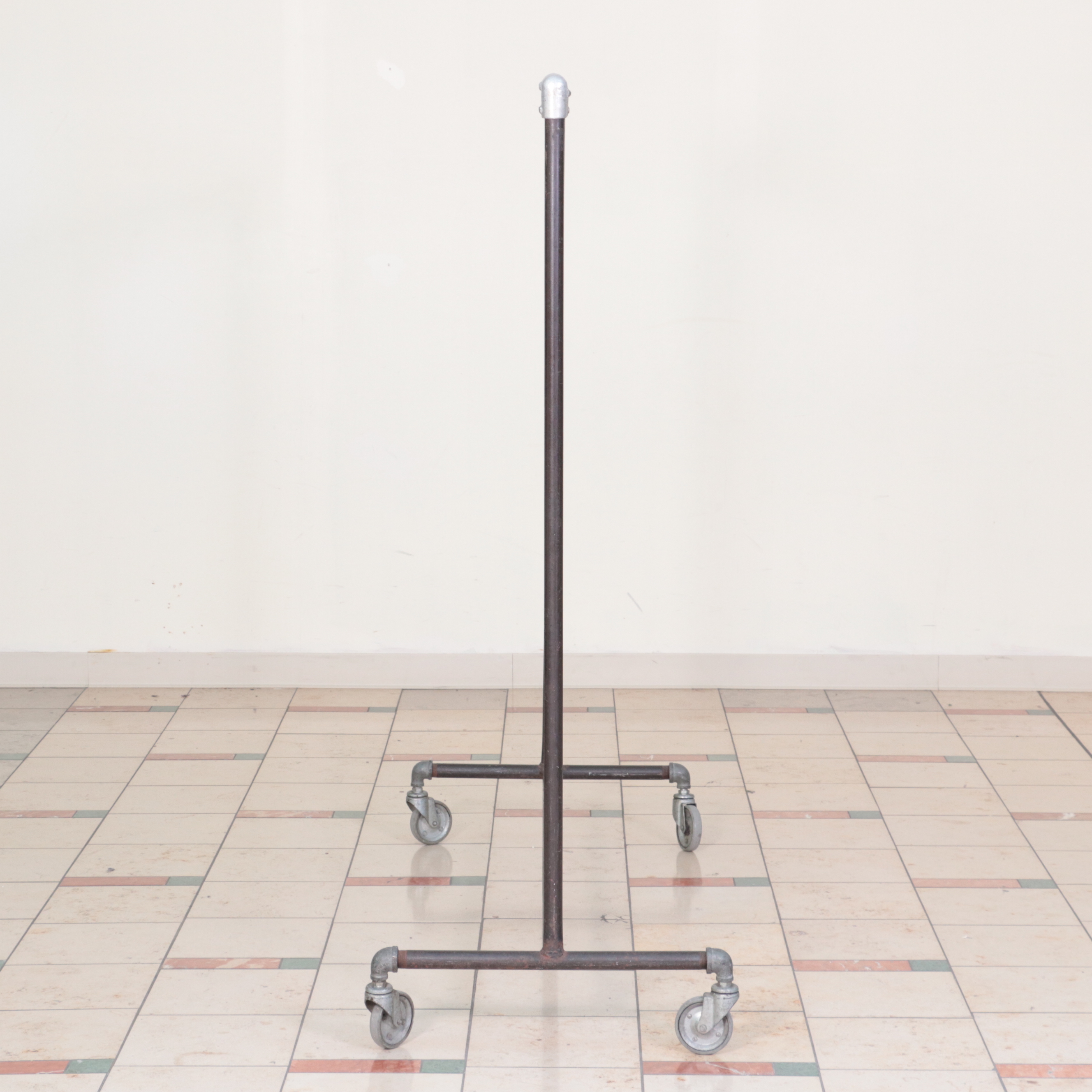 Three Metal Rolling Clothing Display Racks