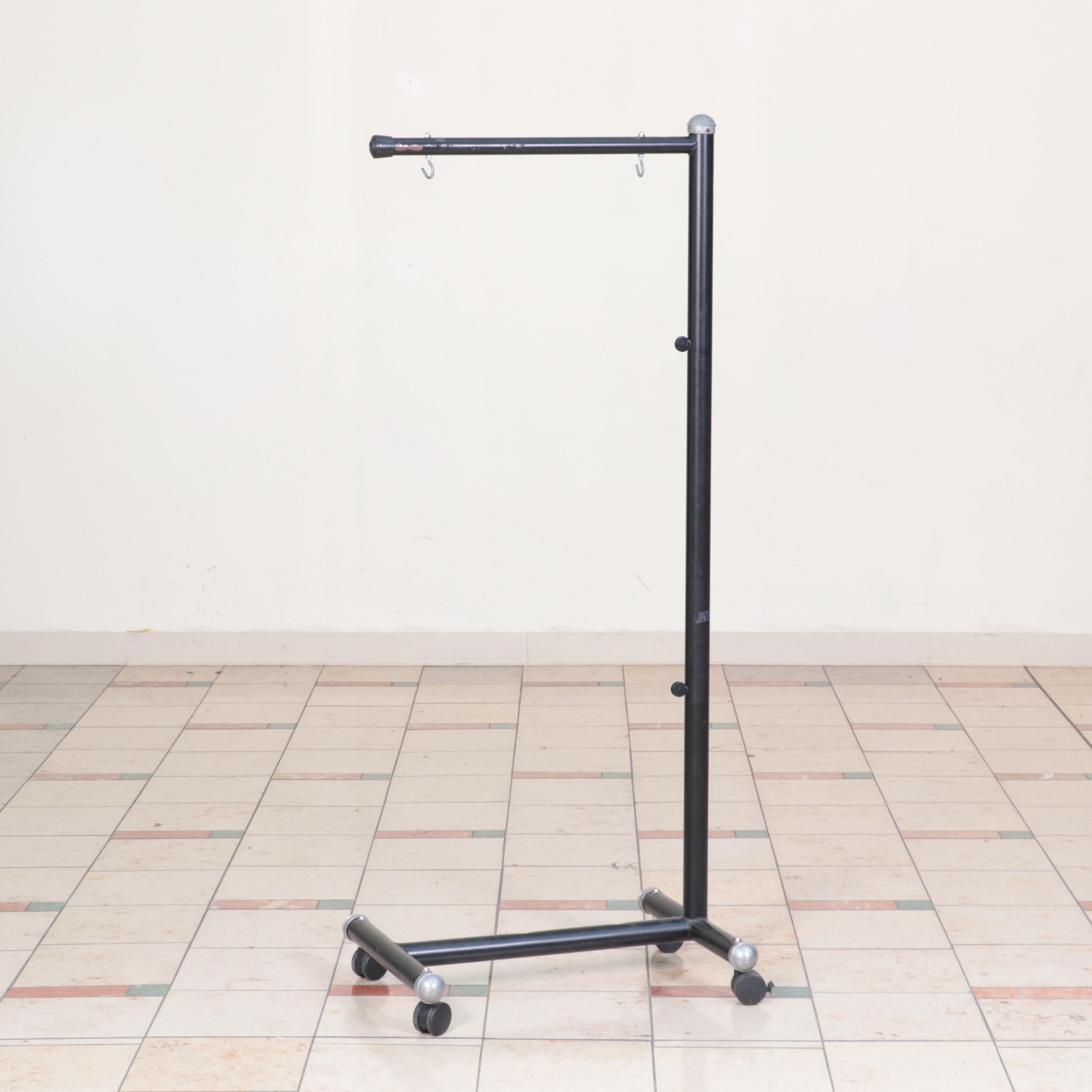 Three Metal Rolling Clothing Display Racks
