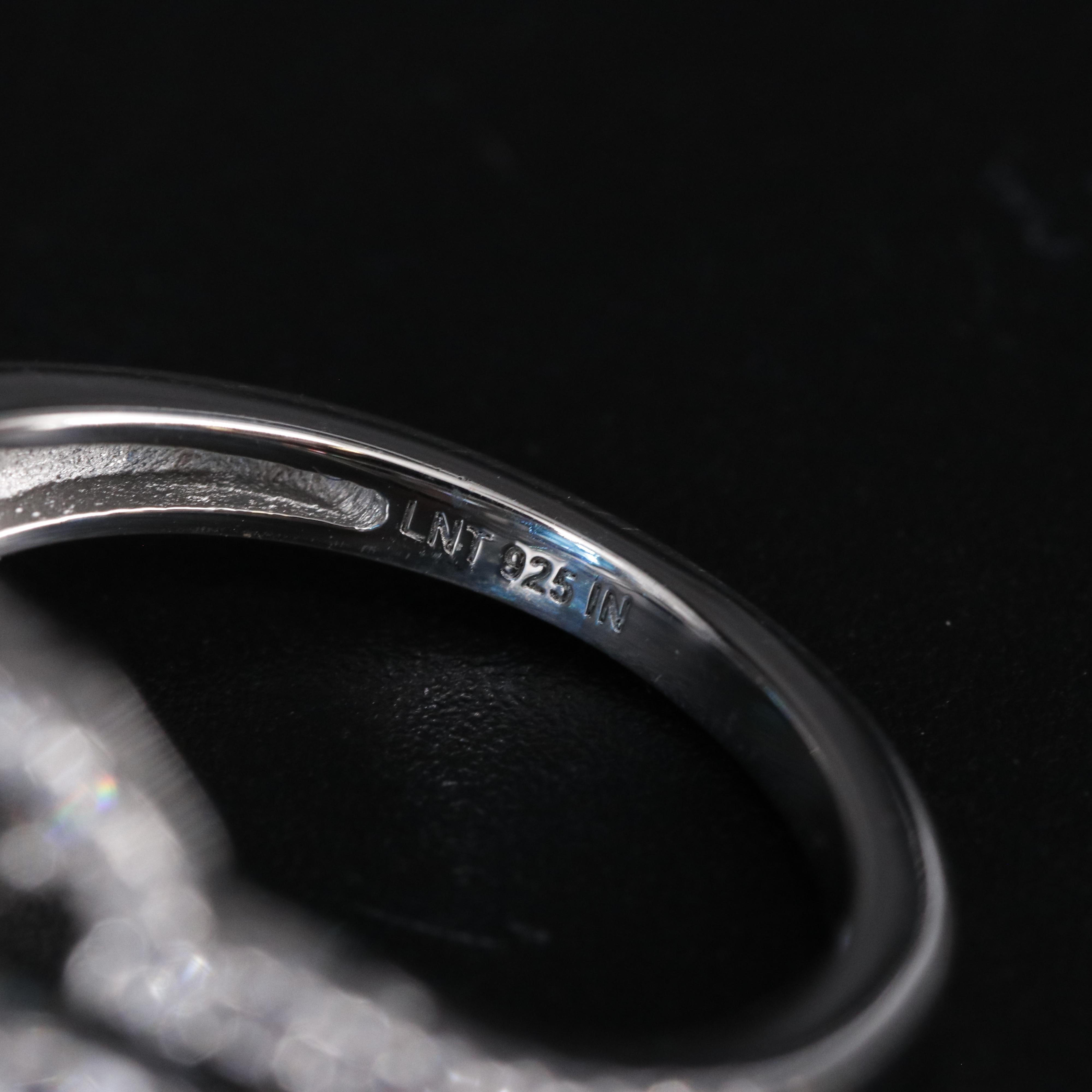 Sterling Silver Topaz and Cubic Zirconia Ring